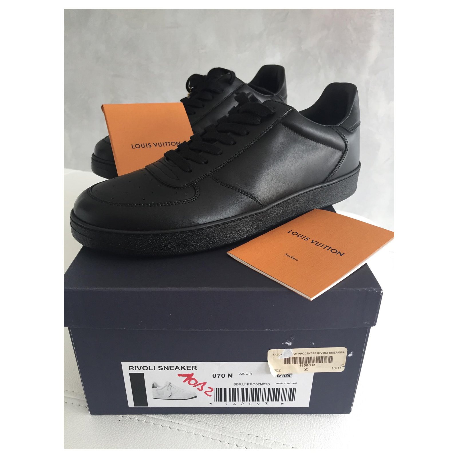 Rivoli leather low trainers Louis Vuitton Black size 12 US in Leather -  37412469