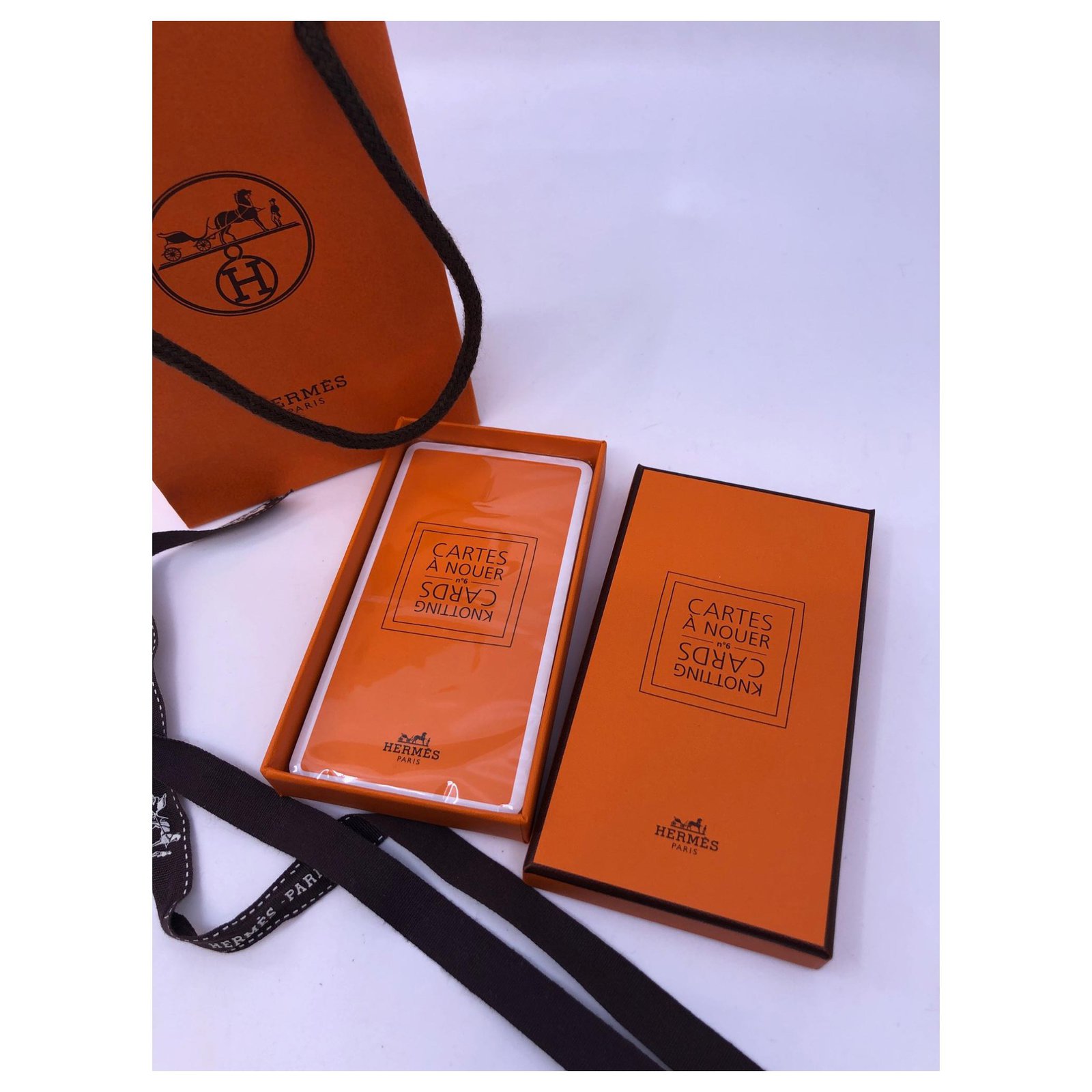Hermès Card to tie White Orange Plastic ref.126995 - Joli Closet