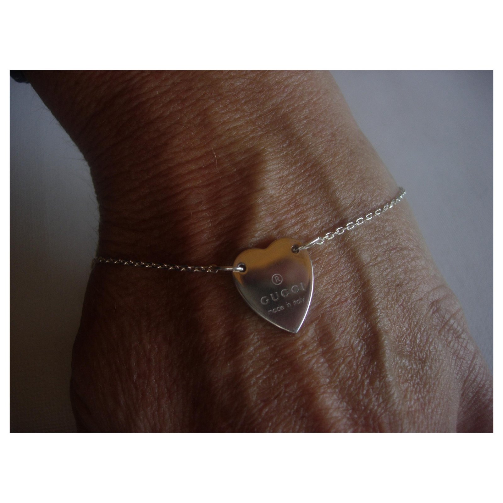gucci bracelet silver heart