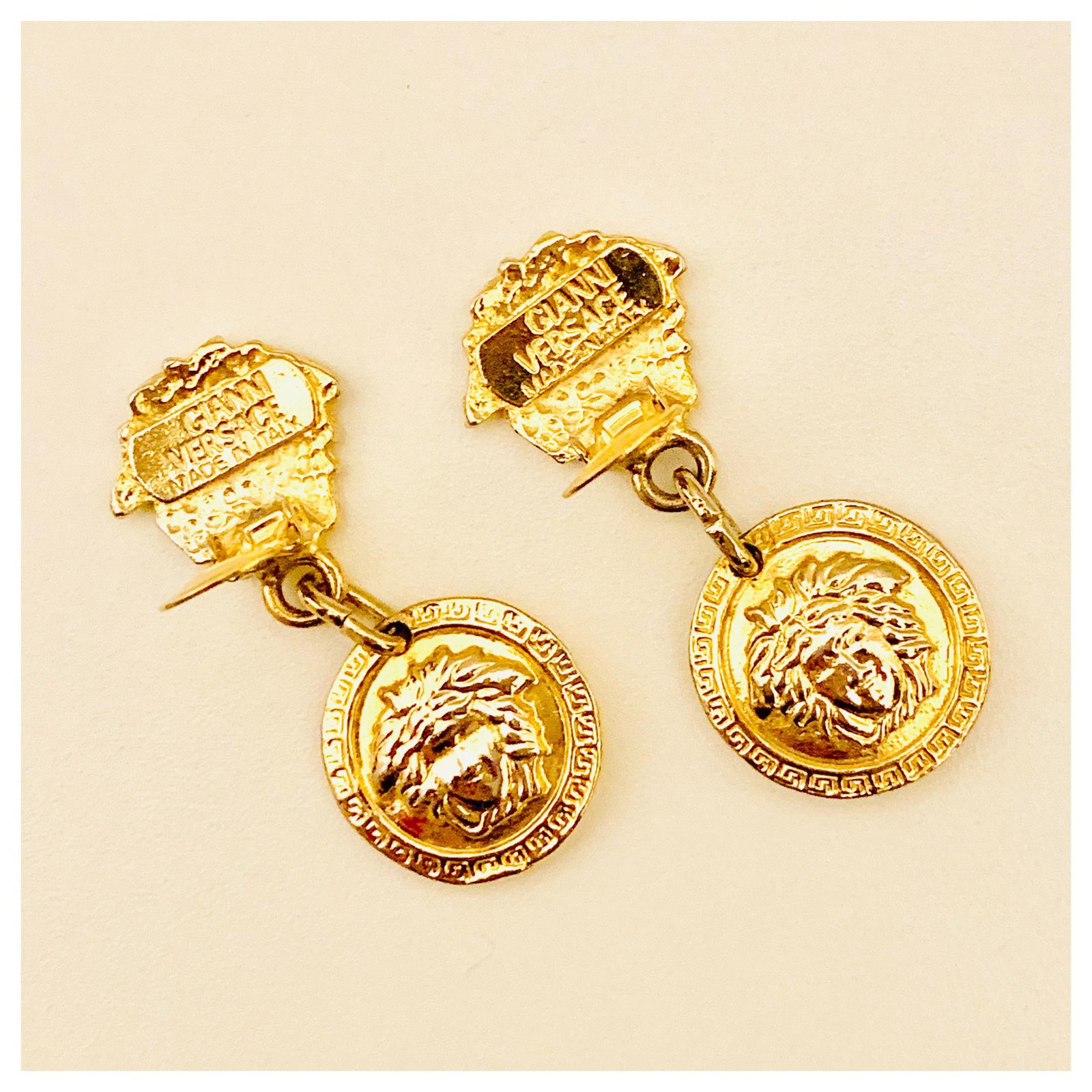 versace clip on earrings