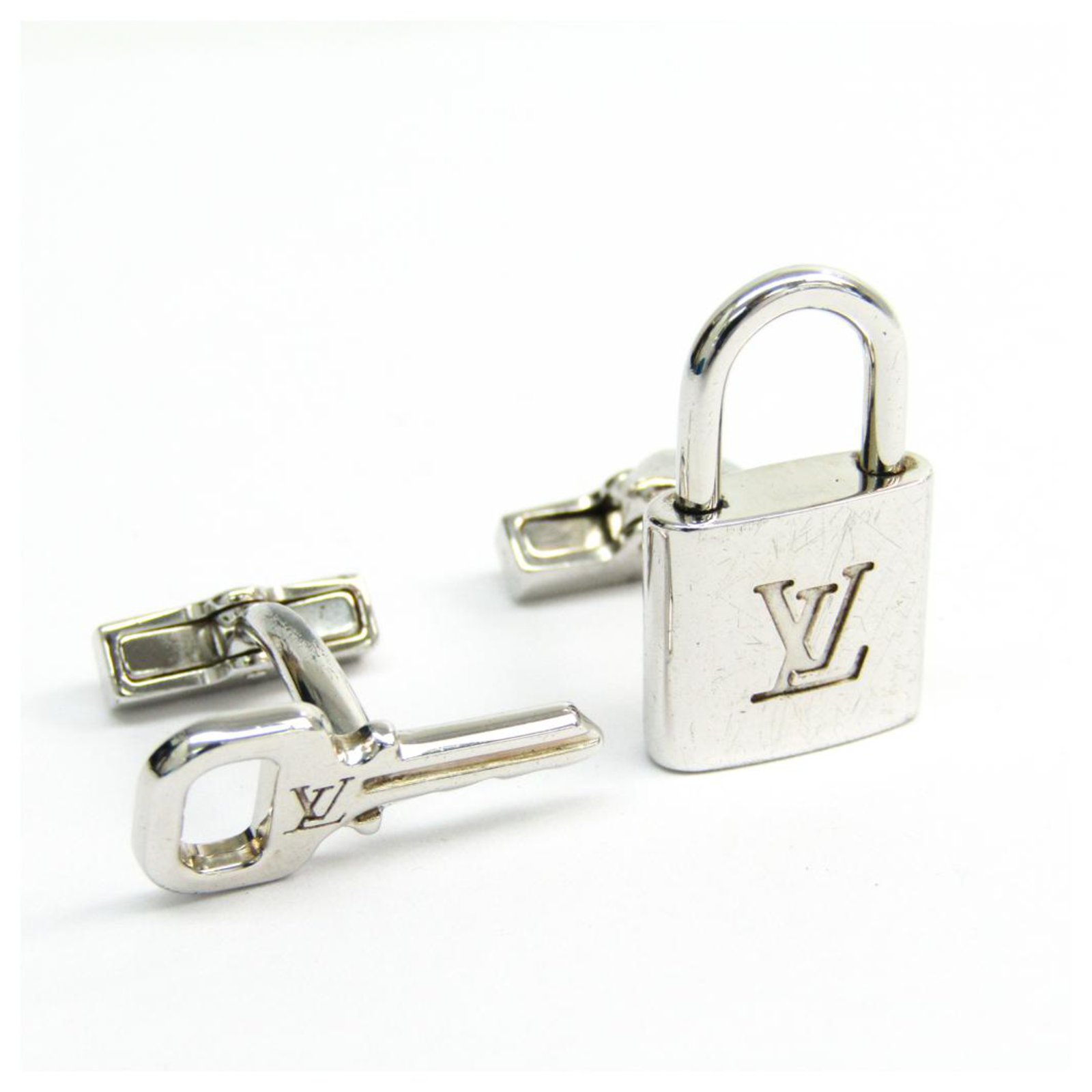 Louis Vuitton Silver Padlock and Key Logo Cufflinks Silvery Metal  ref.138706 - Joli Closet