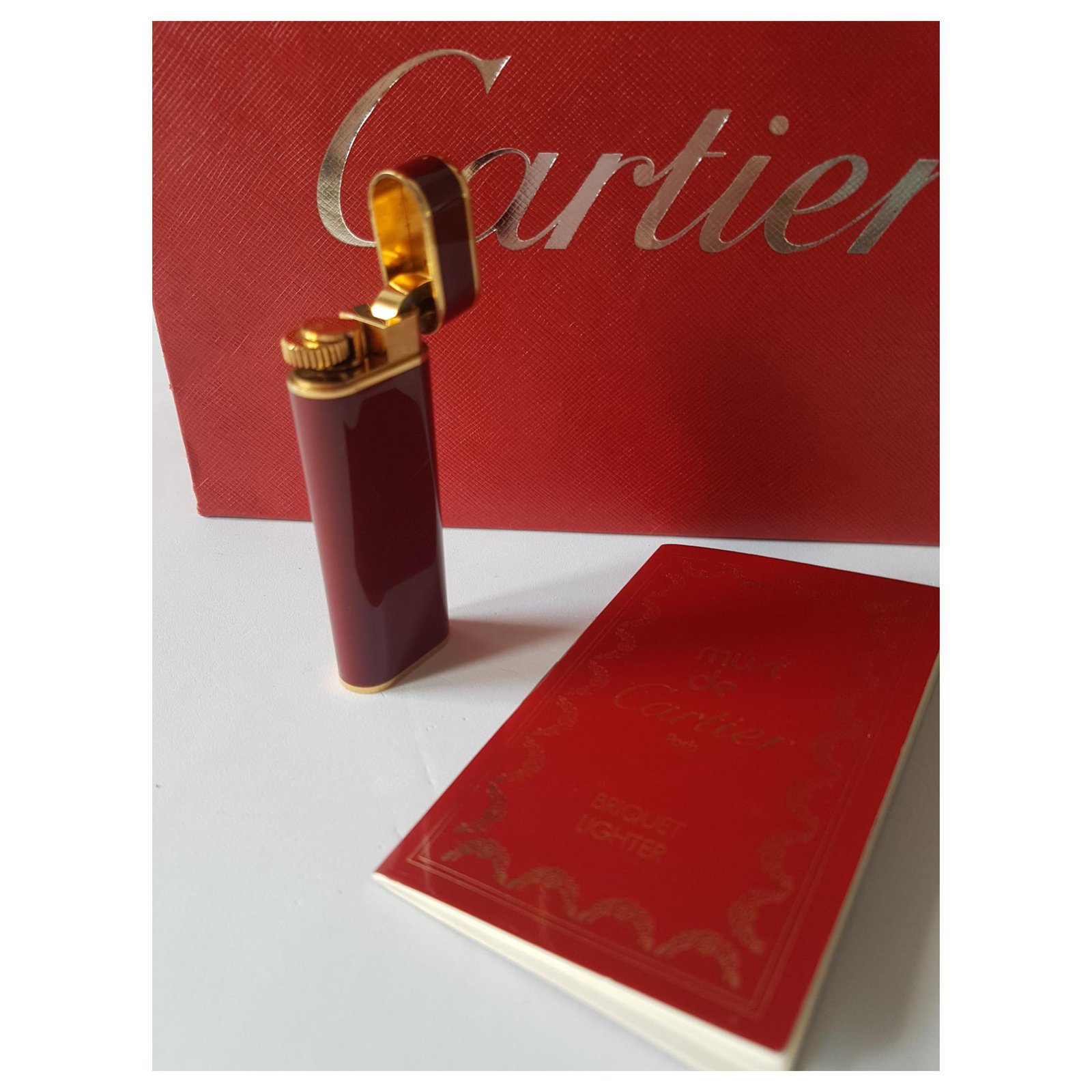 Cartier lighter Golden Dark red Gold-plated ref.144108 - Joli Closet
