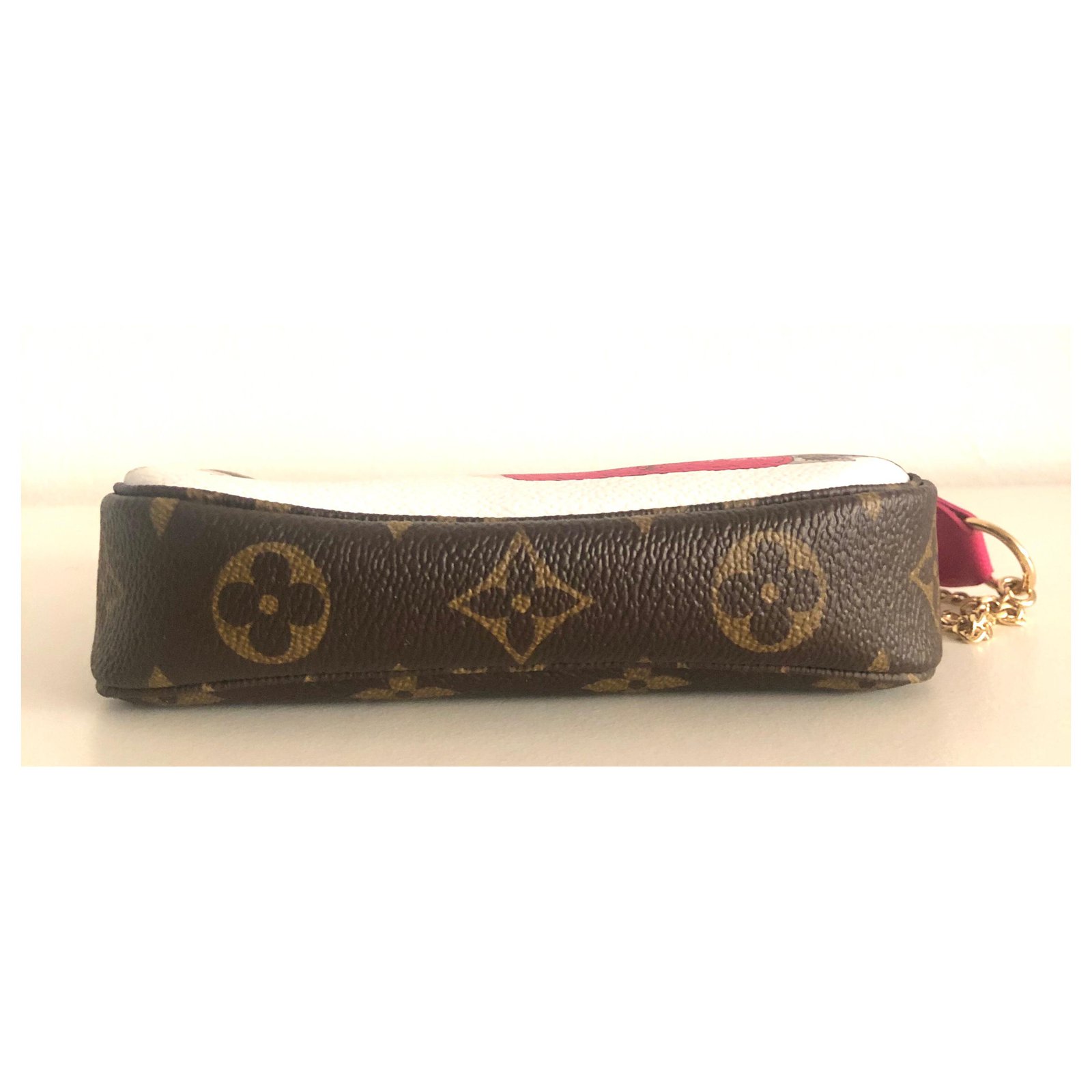 Louis Vuitton Pohctte Accessories Mini Edition Christmas Vivienne Brown  Cloth ref.157538 - Joli Closet