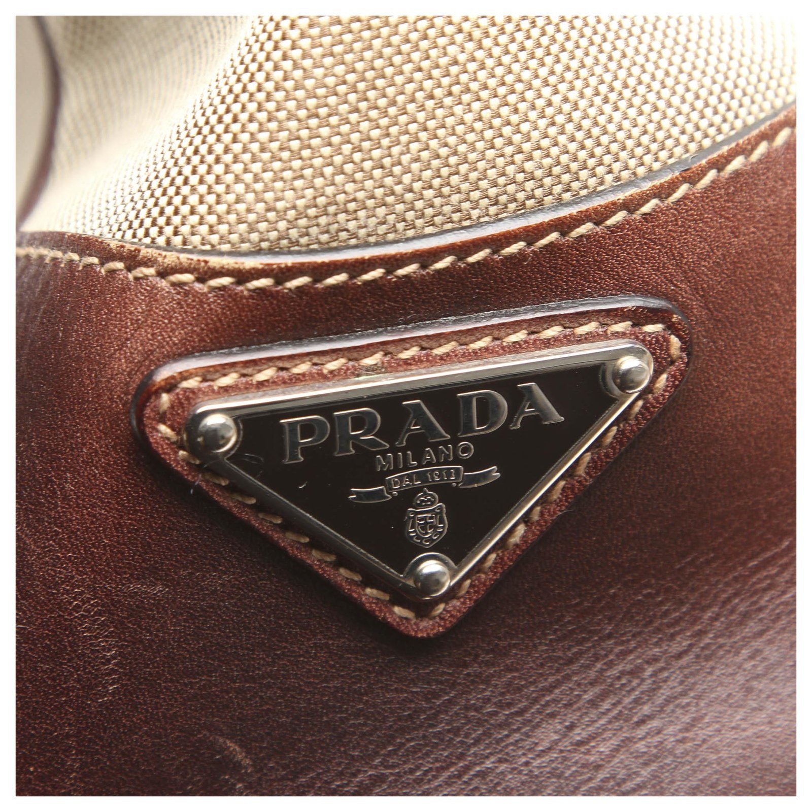 Prada Brown Canapa Canvas Crossbody Bag Beige Leather Cloth Pony-style  calfskin Cloth ref.310188 - Joli Closet
