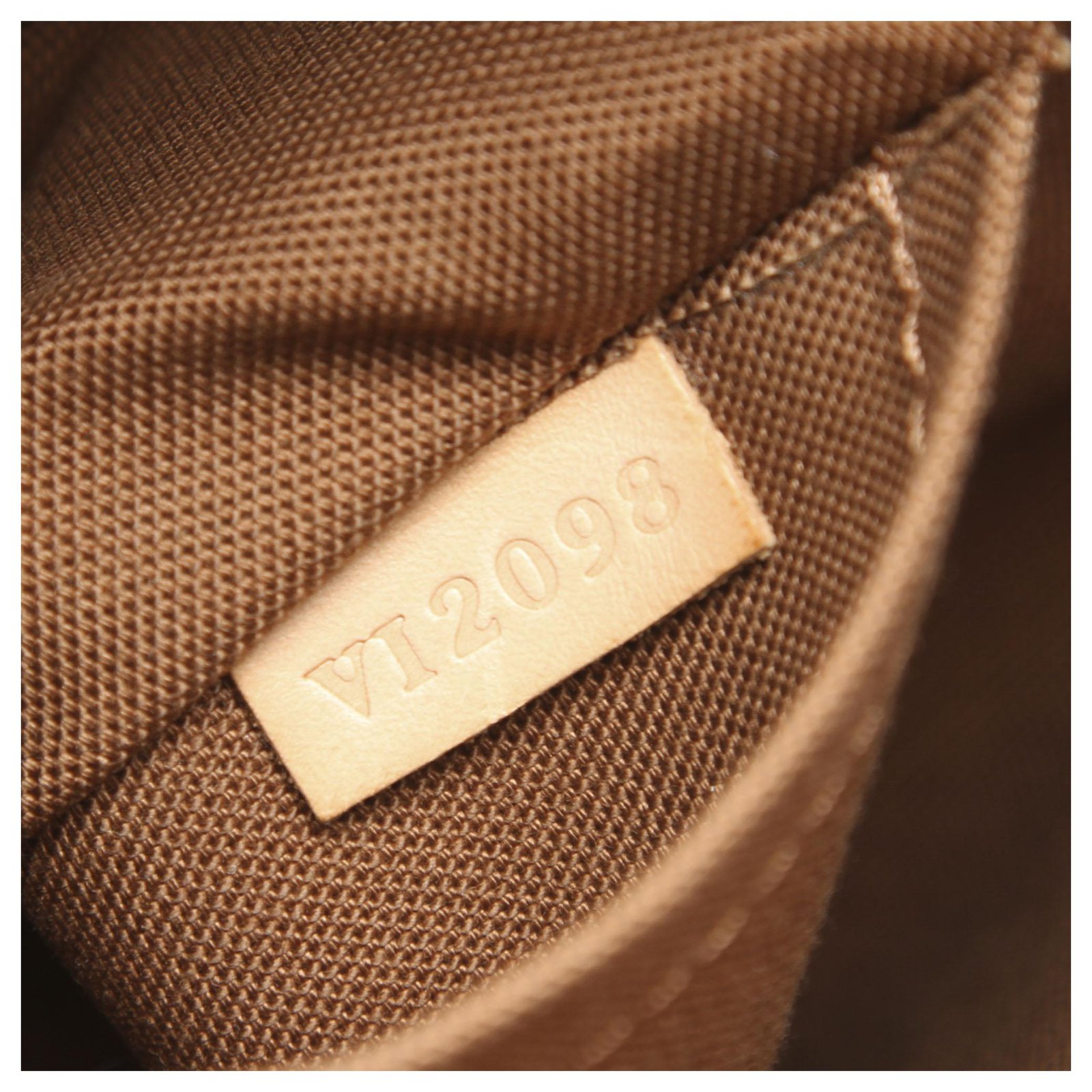 Louis Vuitton Brown Monogram Odeon MM Leather Cloth ref.996409