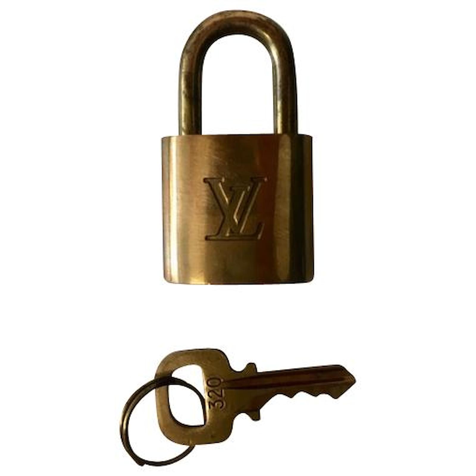 Louis Vuitton Lock Golden Metall ref.190107 Joli Closet