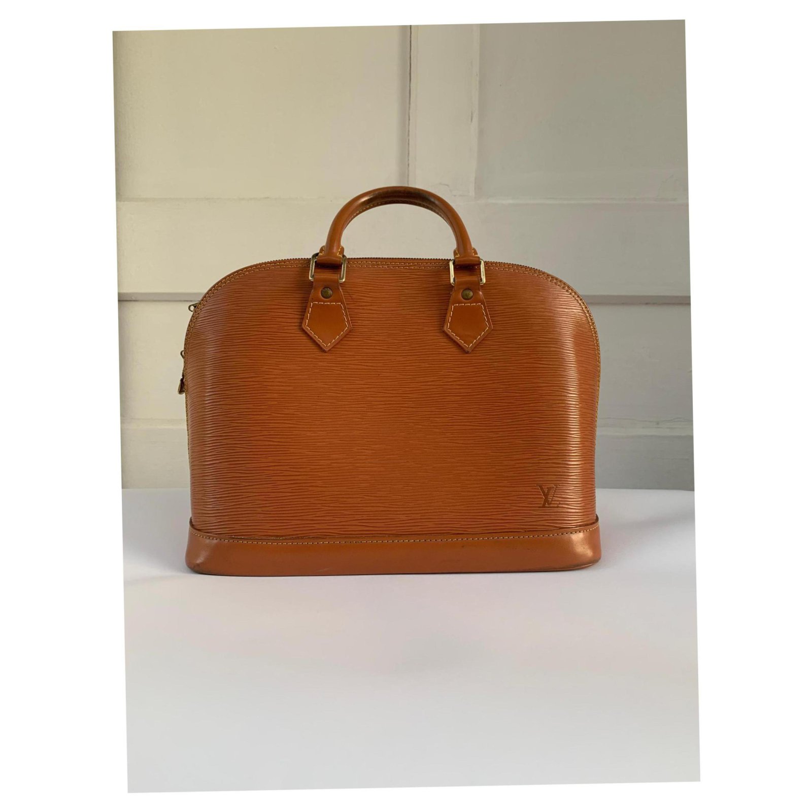 Alma leather handbag Louis Vuitton Brown in Leather - 31725299