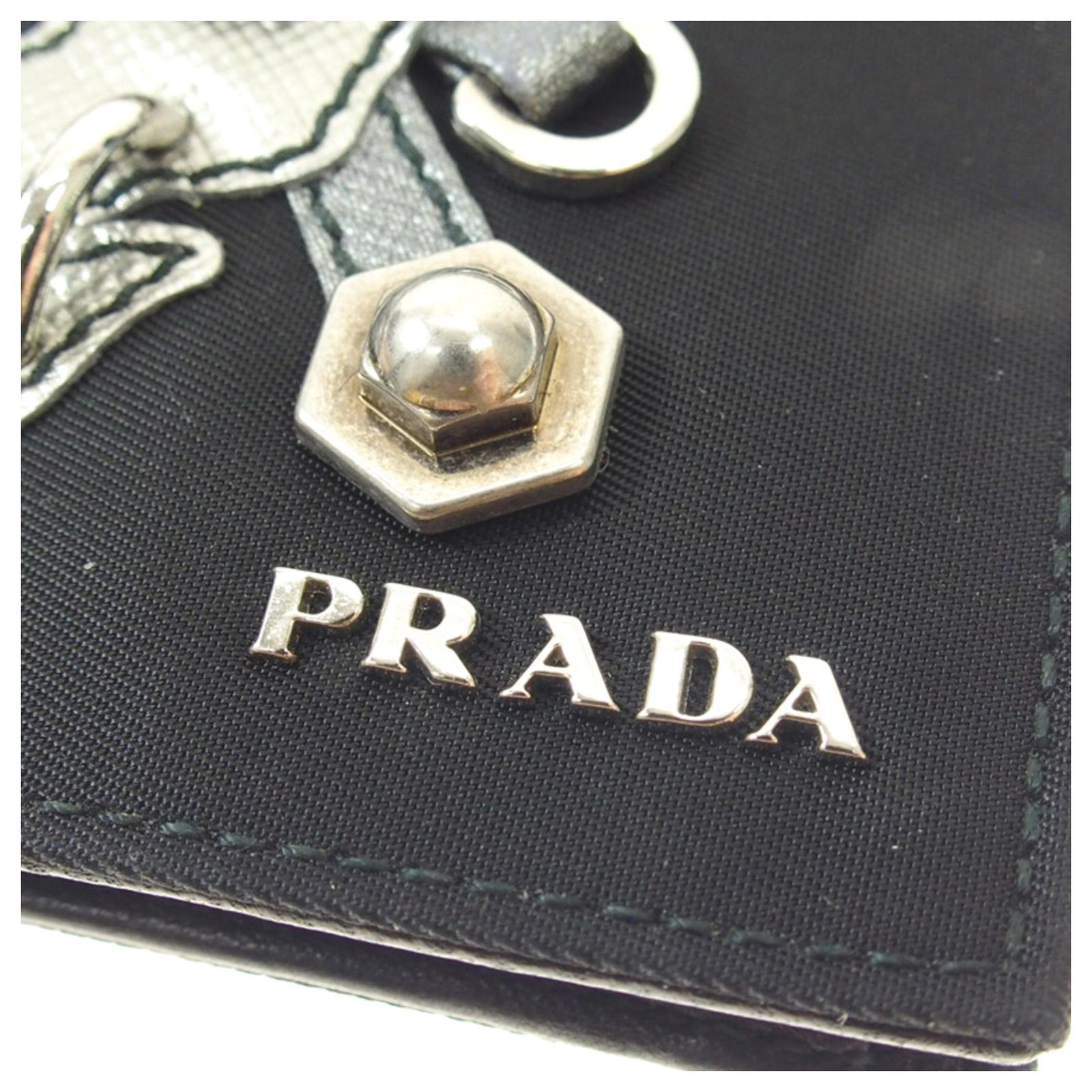 Prada skull and playing cards motif wallets and pouches.