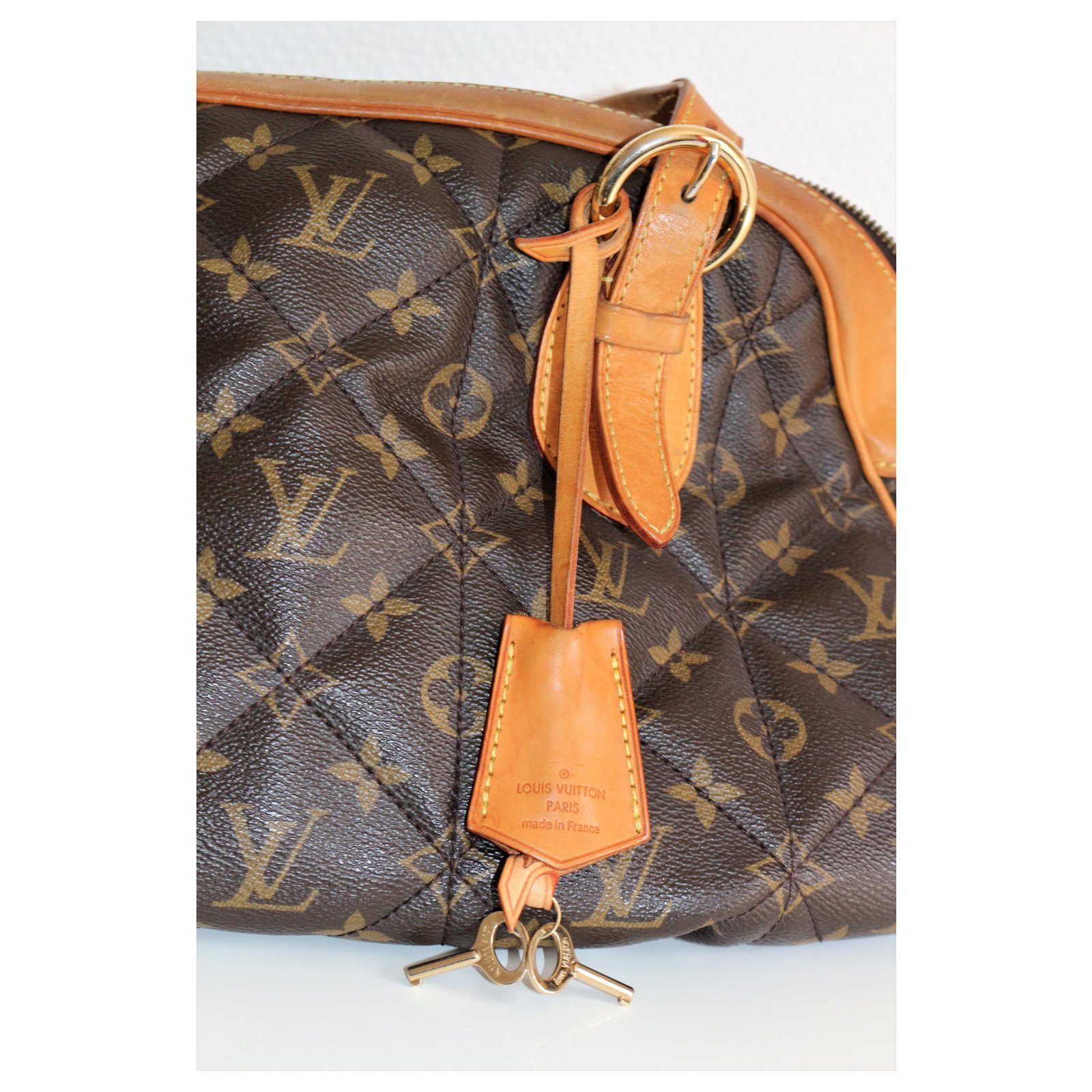 Bowling Louis Vuitton Brown Monogram Etoile Shopper Leather Cloth  ref.127803 - Joli Closet