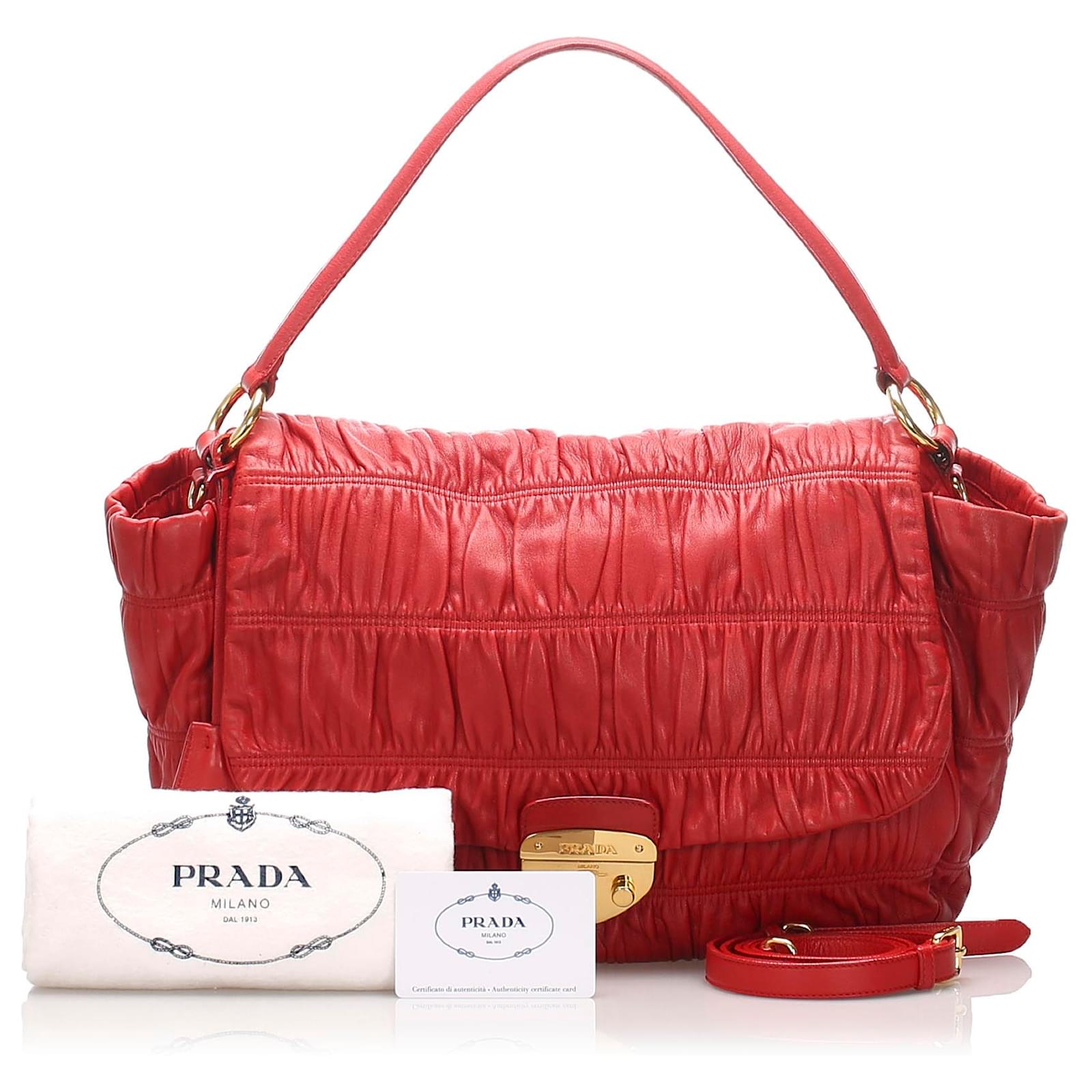 prada bolsa with lock and key