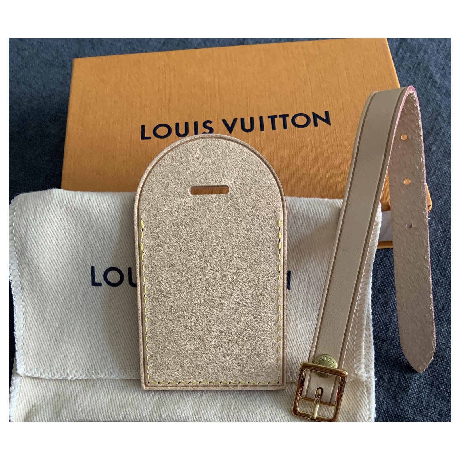 Louis Vuitton Large Vacchetta Luggage Tag hot stamped Madrid Beige Leather  ref.101486 - Joli Closet