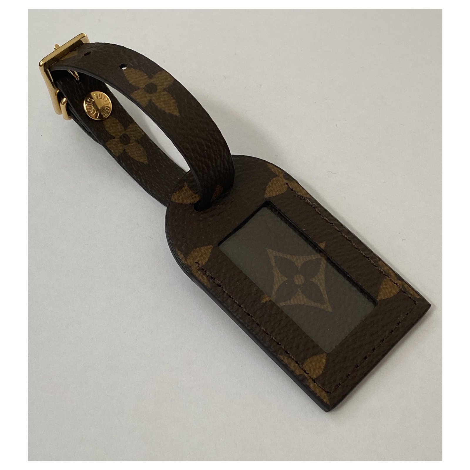 Louis Vuitton luggage tag black Golden Leather ref.359739 - Joli
