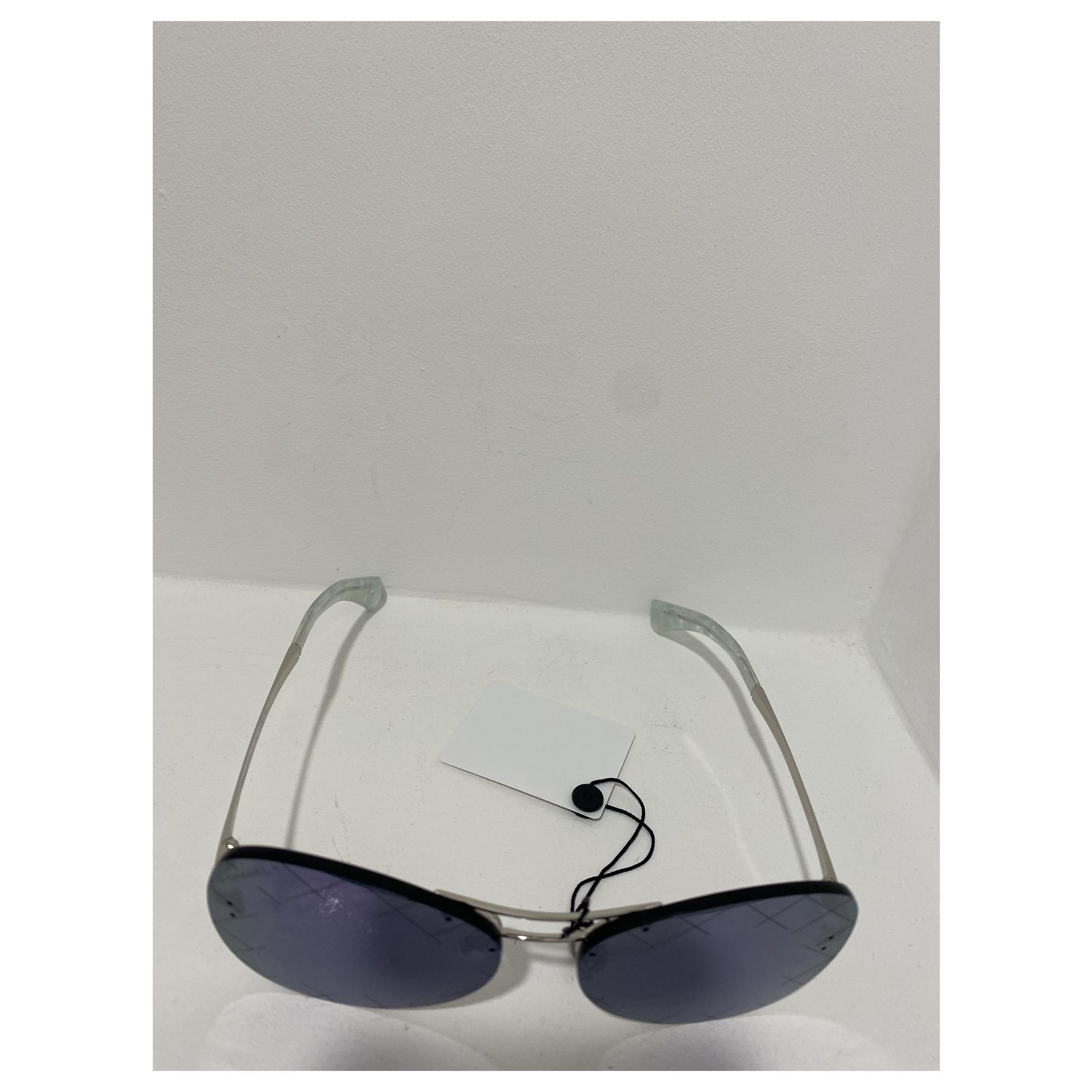 Chanel Sunglasses , purple mirrored glass .Neuves Silvery Steel