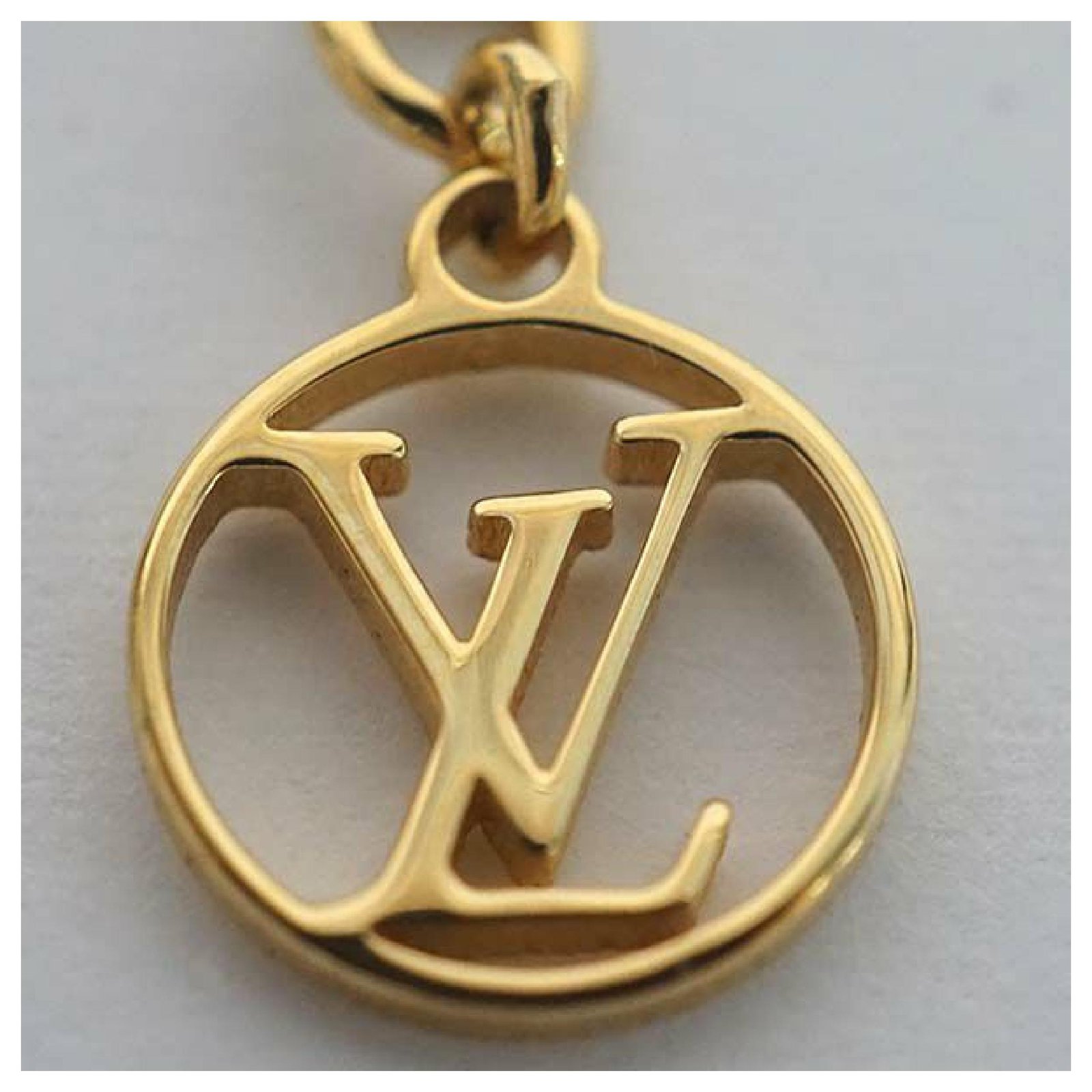 Shop Louis Vuitton Louis Vuitton Necklace Collier L to V M69643 Gold by  import心斎橋ミュゼ