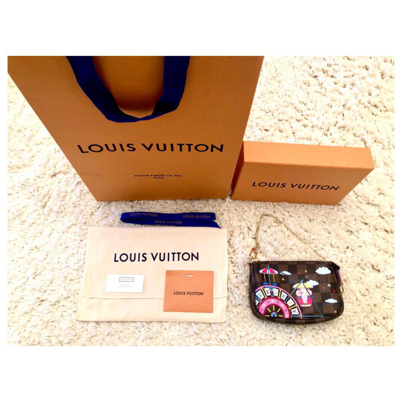Louis Vuitton Mini Pochette Accessories - Christmas Limited Edition 2020  Brown Cloth ref.227866 - Joli Closet