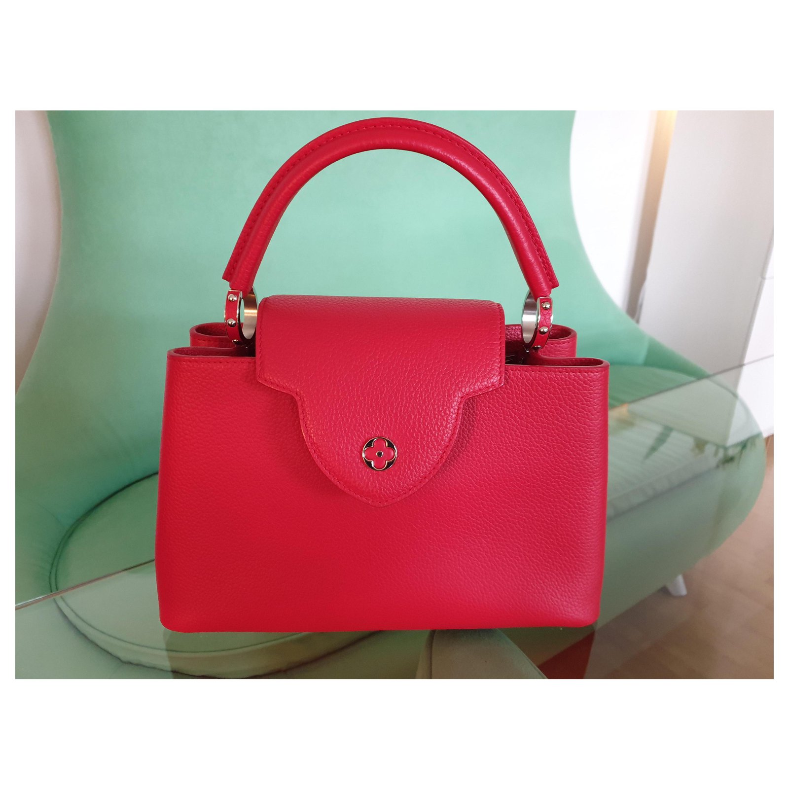 Louis Vuitton handbag Capucines PM in red / rubis Leather ref