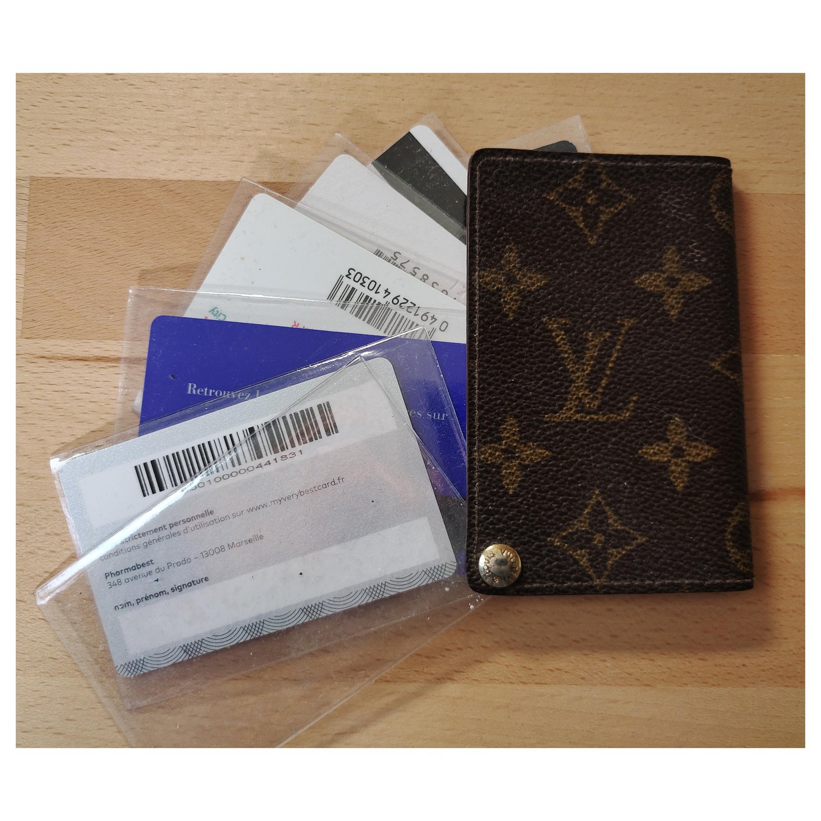 Louis Vuitton Mobile phone case with card holder Dark brown Cloth  ref.501524 - Joli Closet