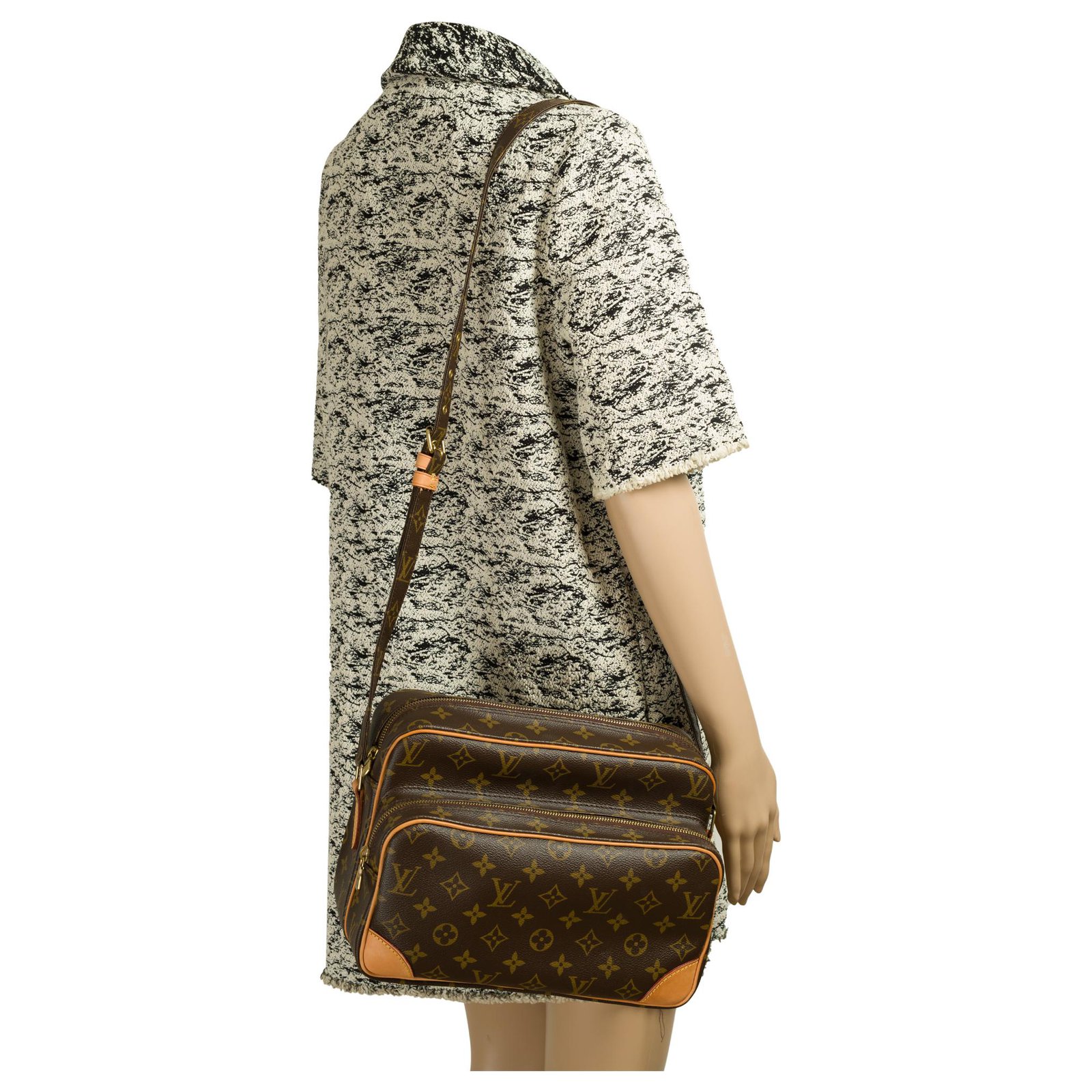 Nile cloth handbag Louis Vuitton Brown in Cloth - 36677691