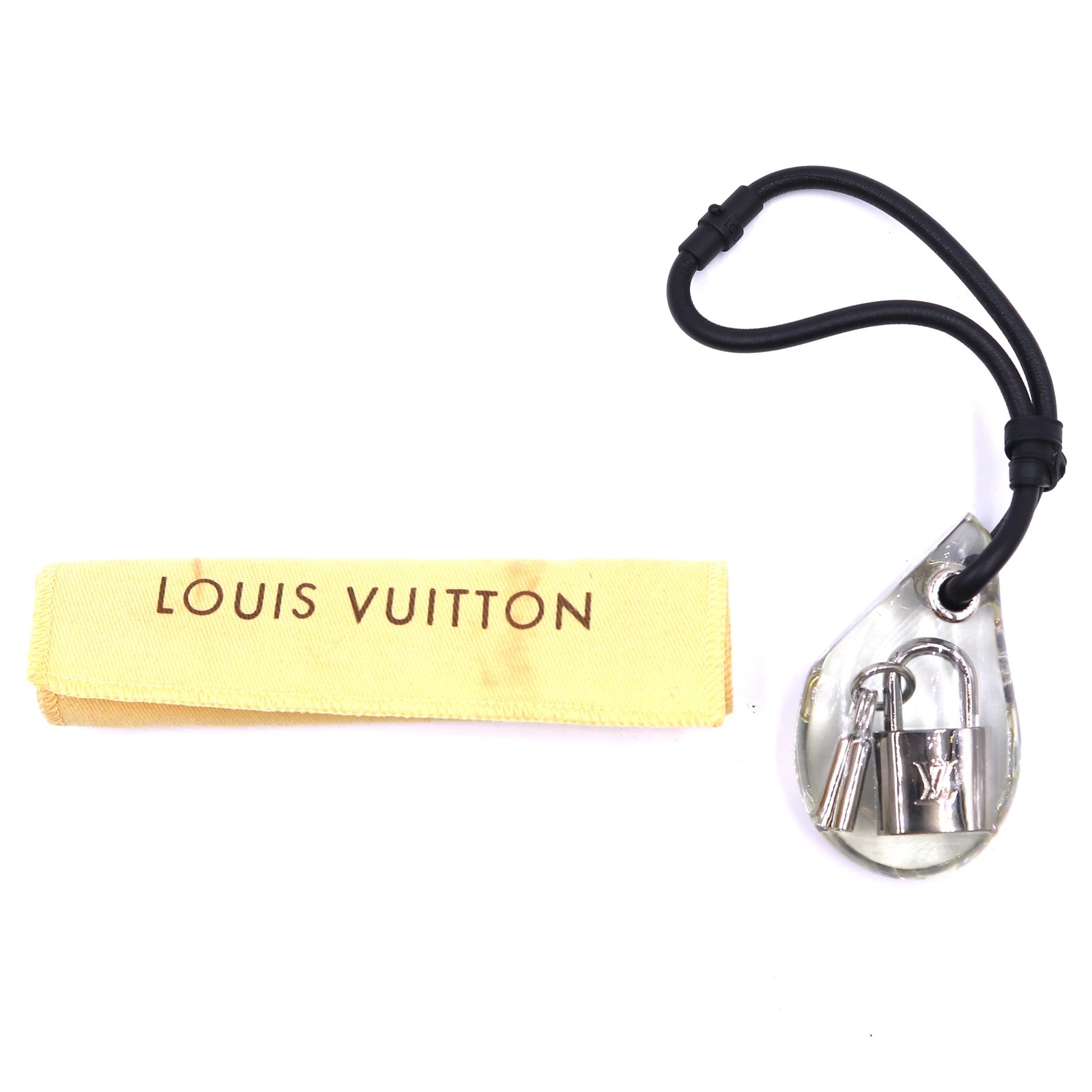 Louis Vuitton Silver Lock and Key Clear Amber Bag Charm Silvery ref.260808  - Joli Closet