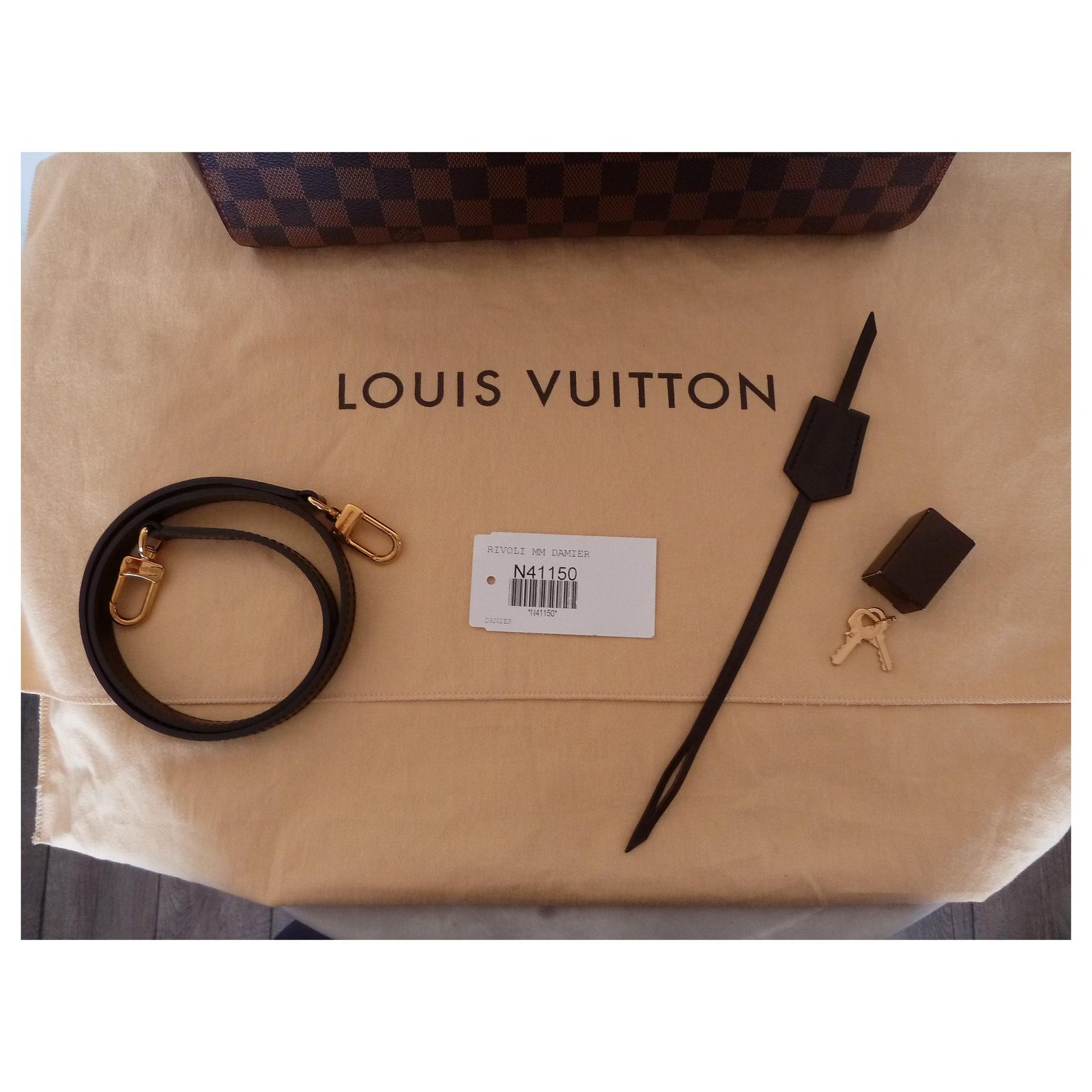 LOUIS VUITTON Rivoli MM Damier Ebène bag Brown Leather ref.264511
