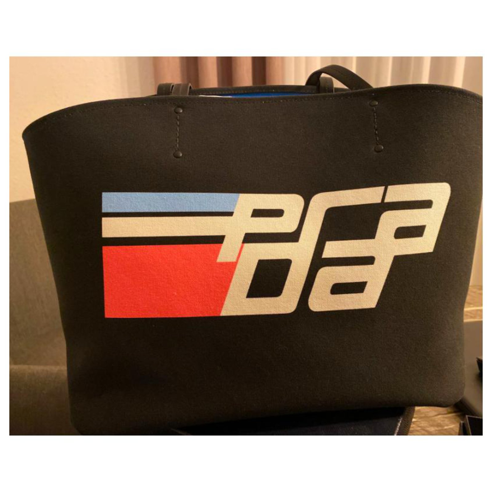 Prada racing logo on sale bag