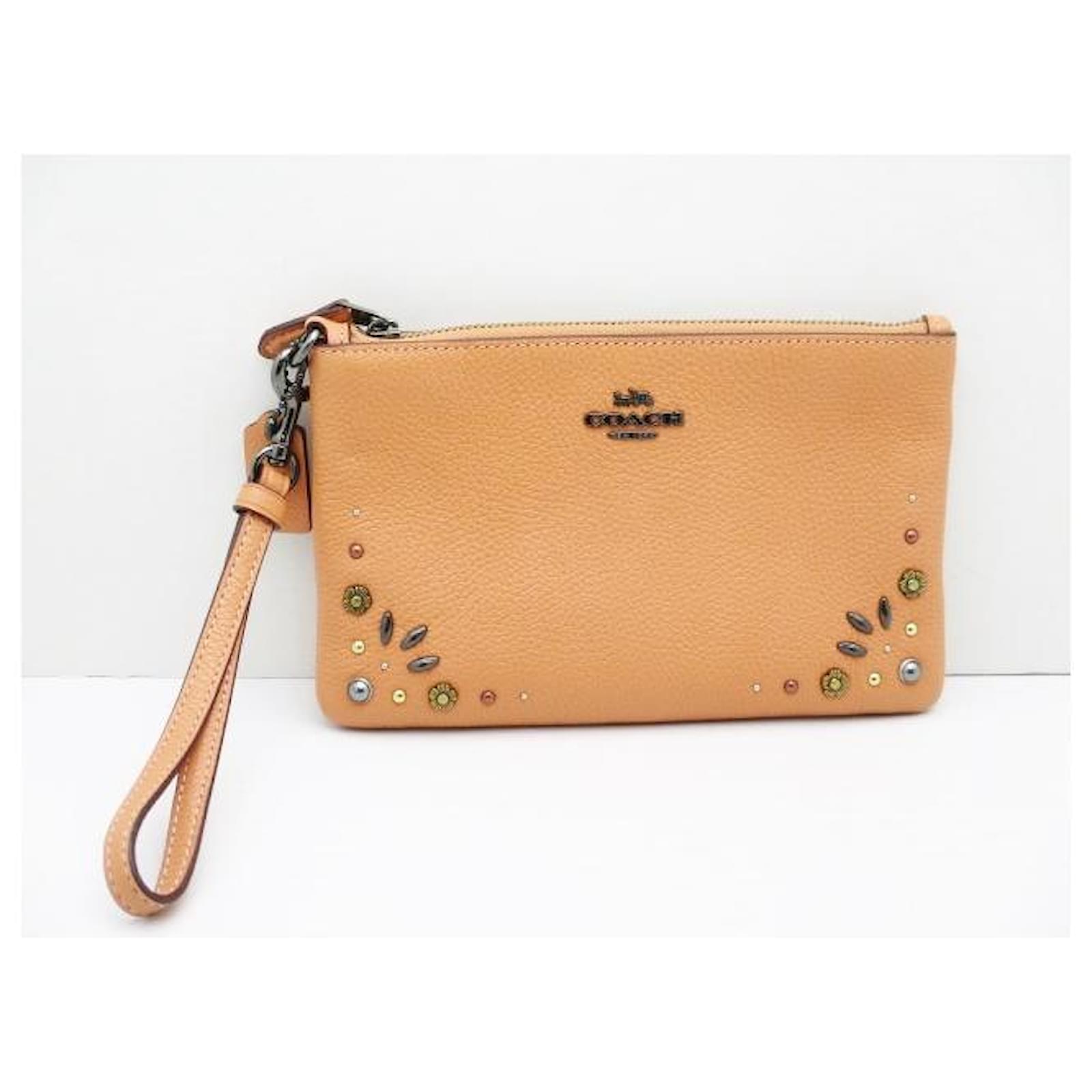 Coach Clutch bag Orange Leather ref.279998 Joli Closet