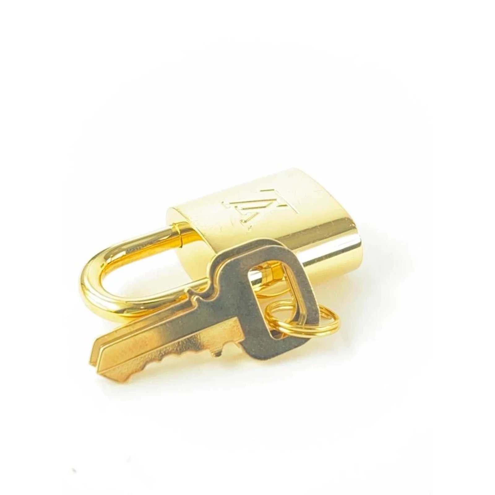 Louis Vuitton padlock 437 gold Golden Steel ref.323149 - Joli Closet