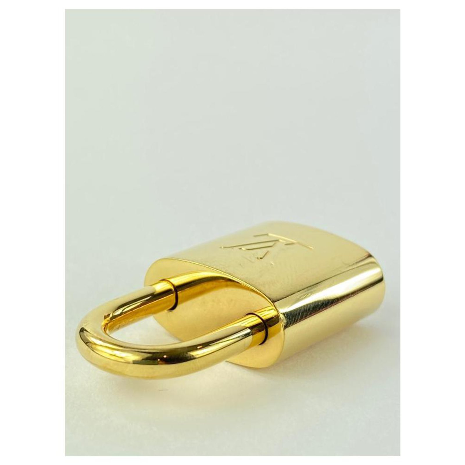 Louis Vuitton Lockit Golden White gold ref.992277 - Joli Closet