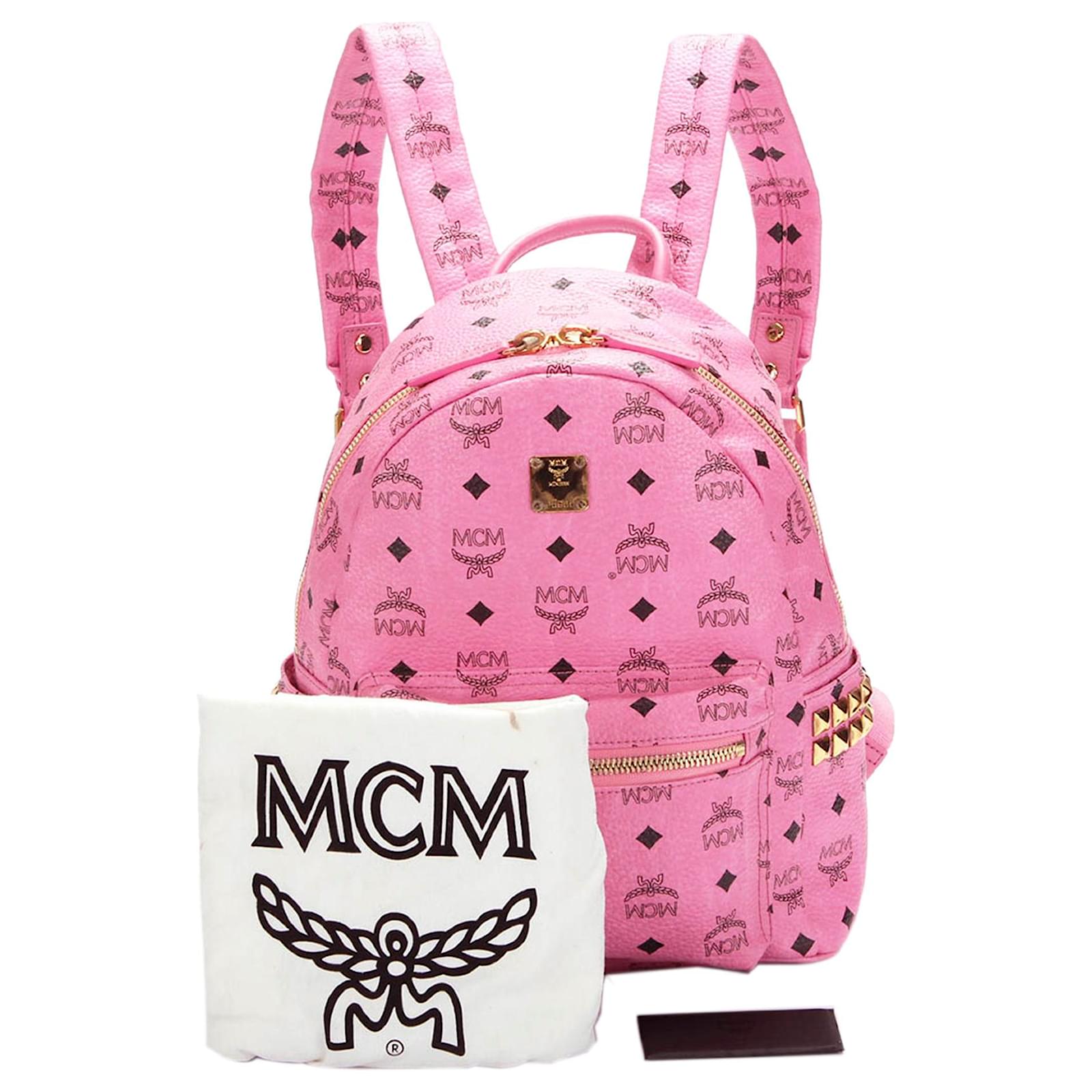 pink mcm backpack with studs