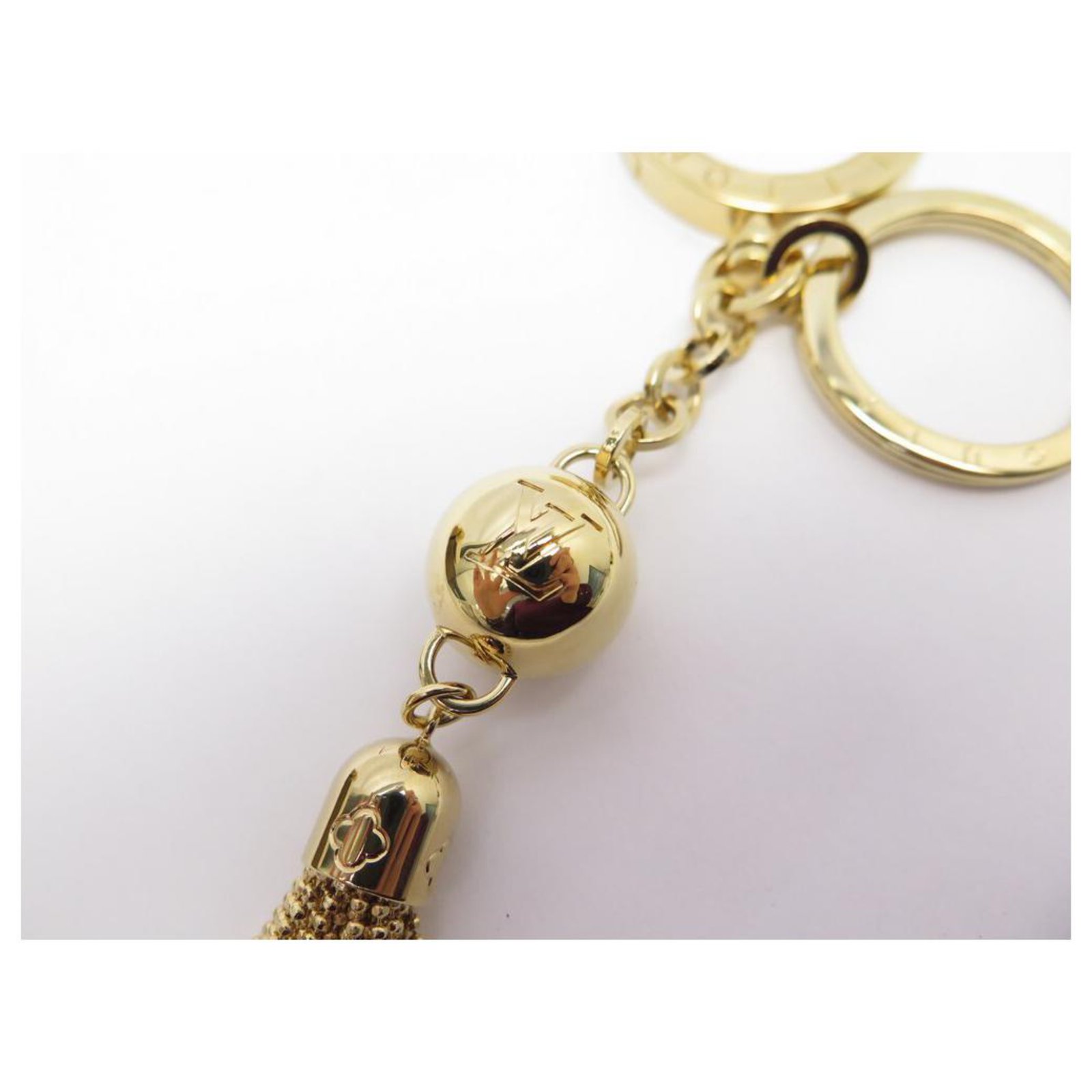 NEW LOUIS VUITTON POMPOM M KEYCHAIN65215 GOLD JEWELERY BOX KEY RING BAG  Golden Metal ref.311714 - Joli Closet