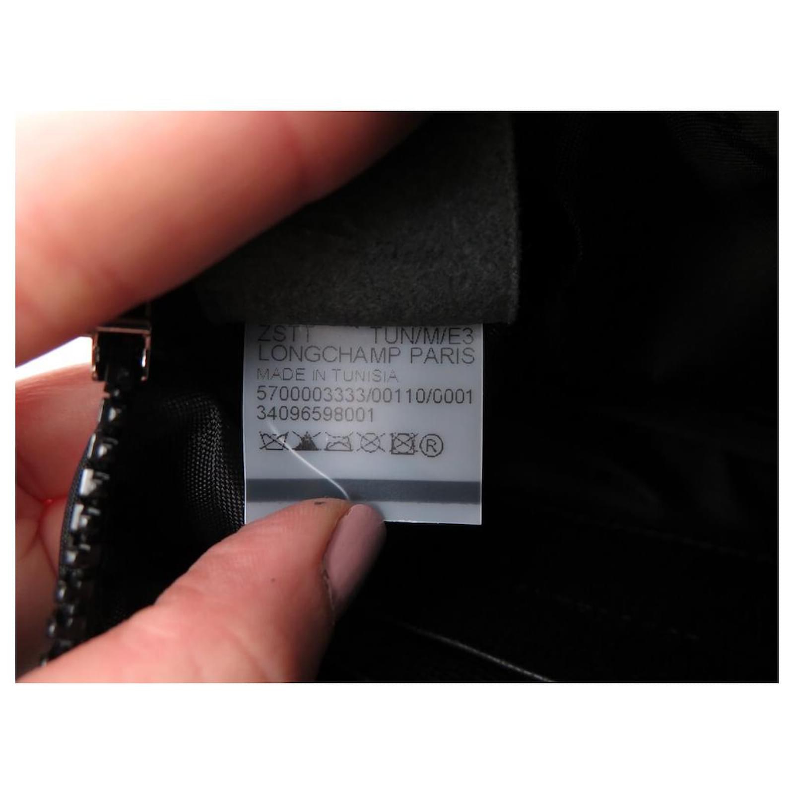 harga pouch longchamp original