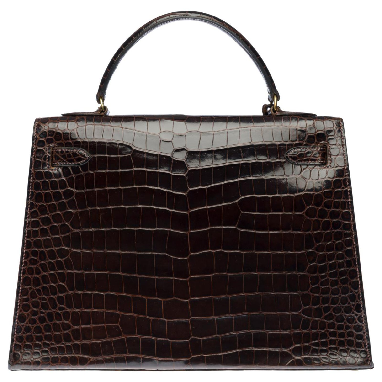 HERMES. 32cm Kelly bag in brown porosus crocodile, gold-…