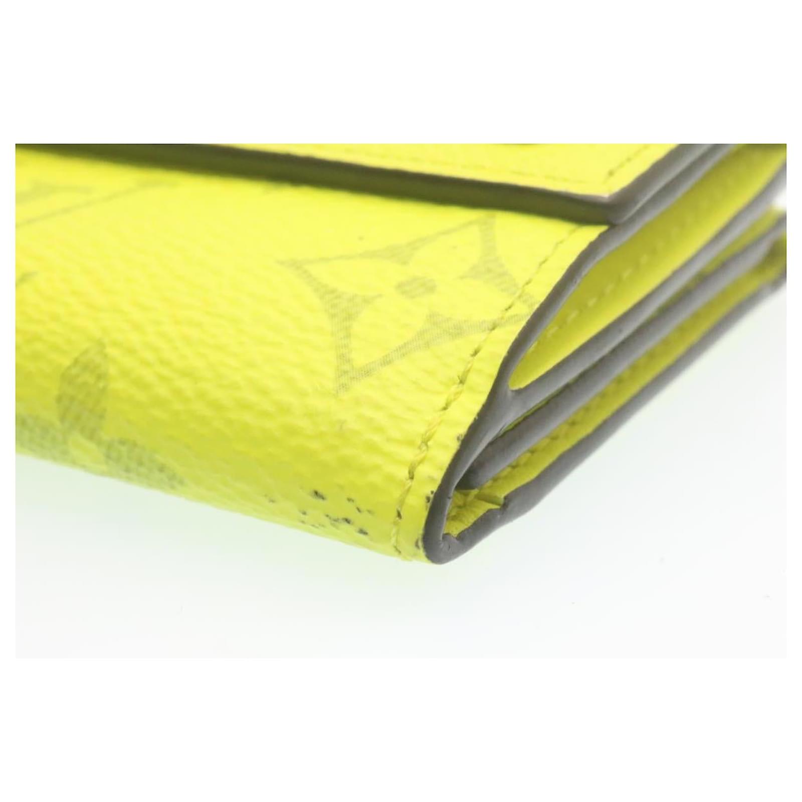 LOUIS VUITTON Monogram Taiga Discovery Compact Wallet Yellow 1232482