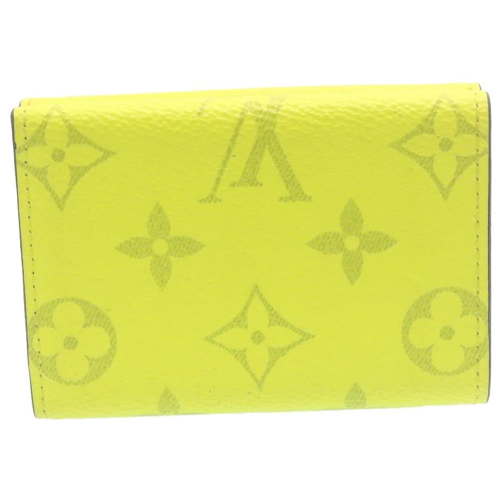 LOUIS VUITTON Monogram Taiga Discovery Compact Wallet Yellow 1232482