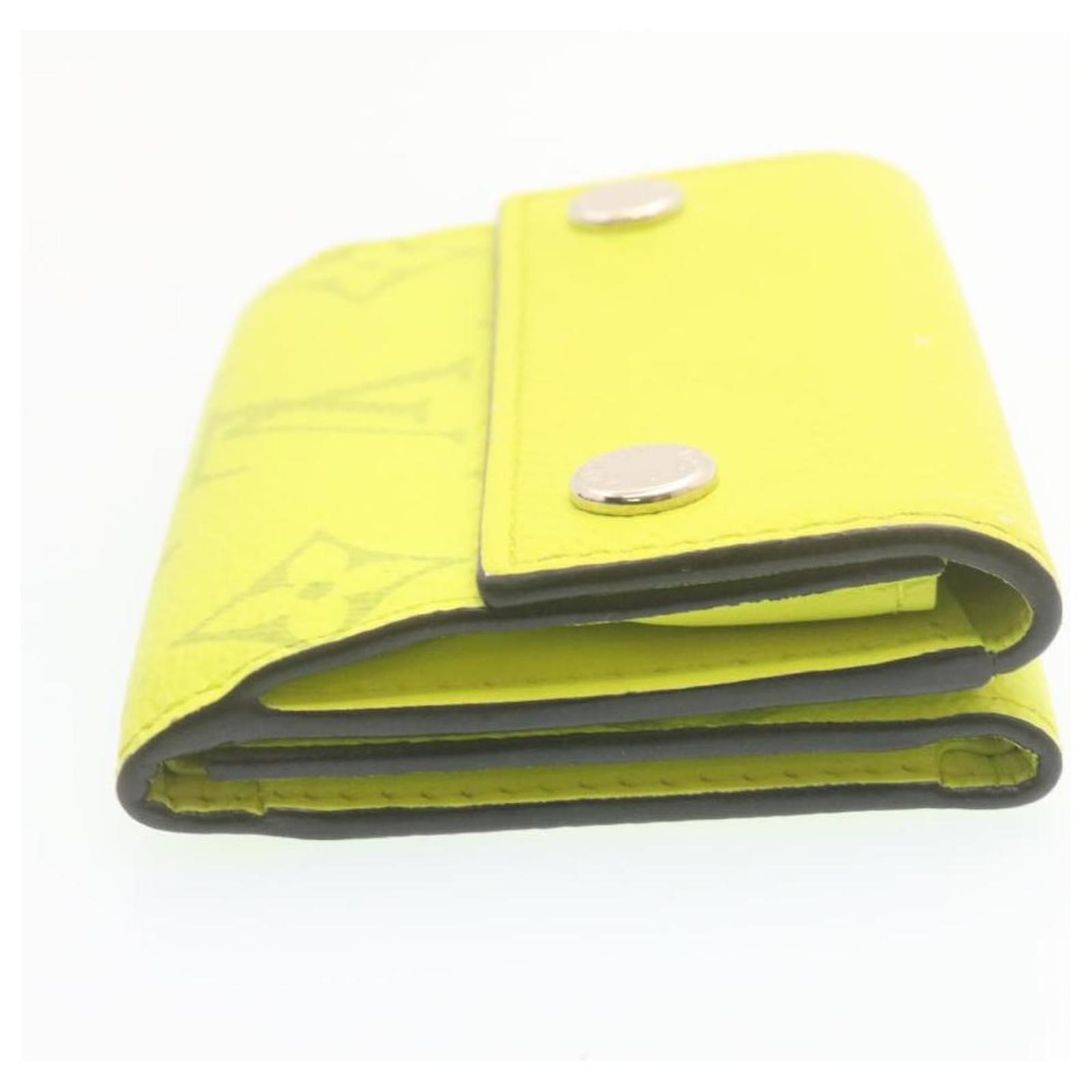 LOUIS VUITTON Monogram Taiga Discovery Compact Wallet Yellow 1232482