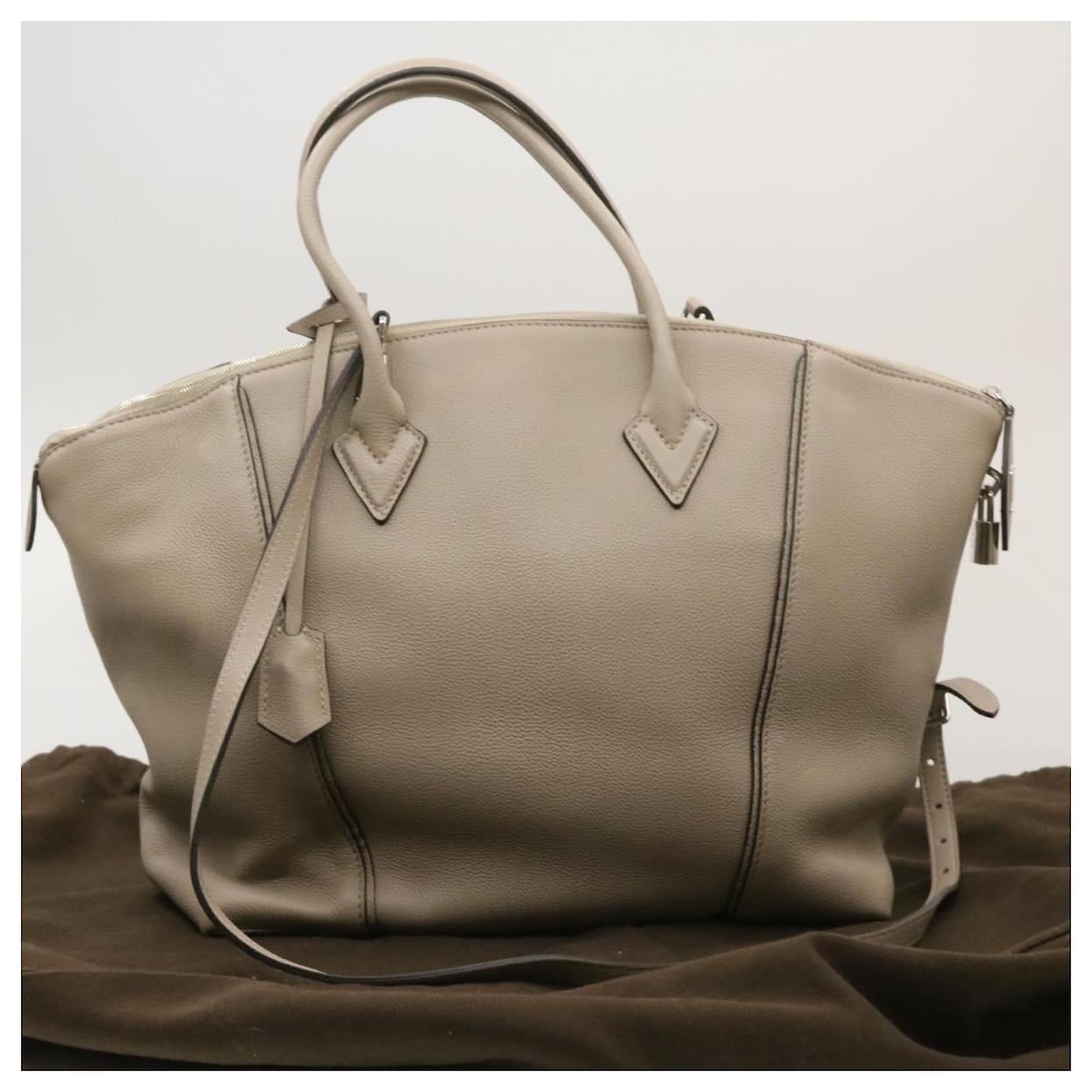 Louis Vuitton Galet Veau Cachemire Soft Lockit PM Handbag