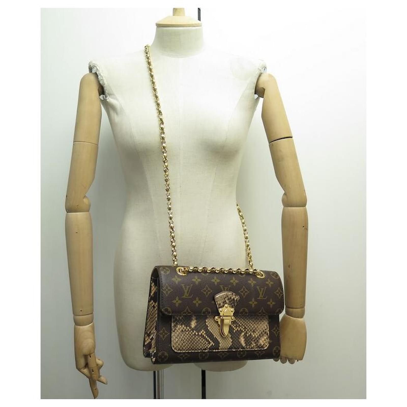 Louis Vuitton Victoire Handbag Monogram Canvas and Python