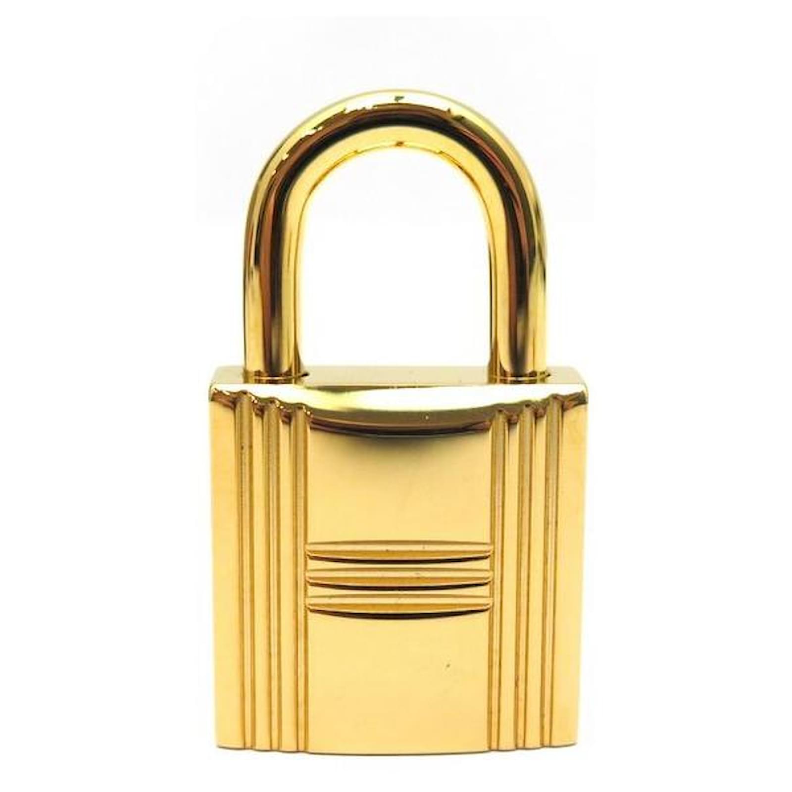 Hermès golden padlock for Birkin Kelly or Bolide bag
