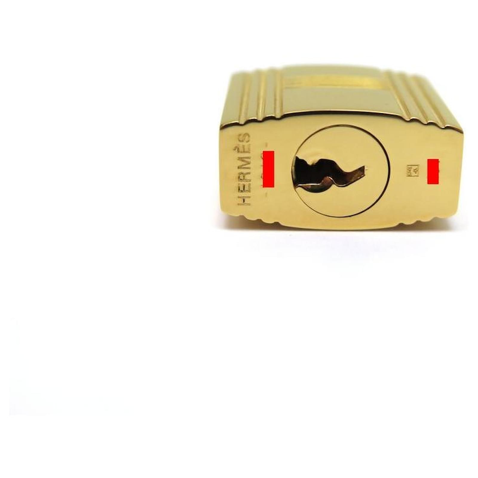 Hermès golden padlock for Birkin Kelly or Bolide bag