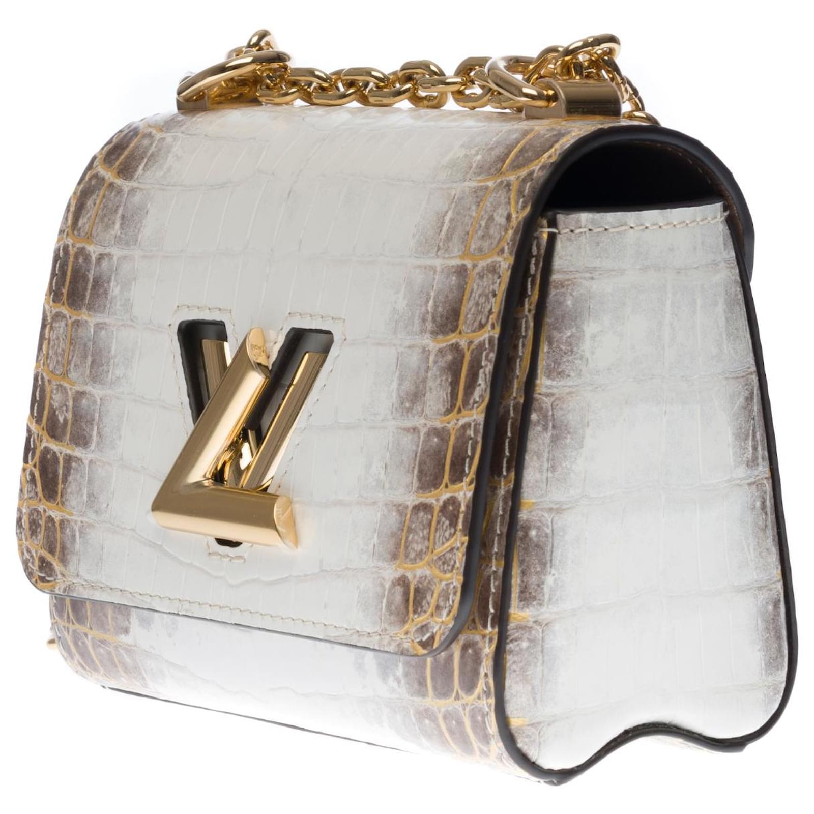 Exceptional and precious Louis Vuitton Twist Mini bag in white