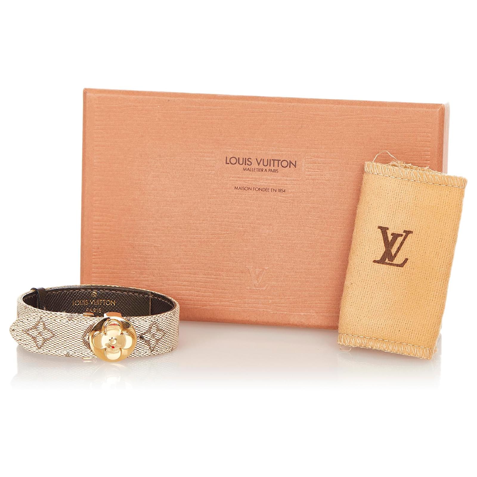 Louis Vuitton Gray Monogram Mini Lin Good Luck Bracelet Golden Grey Cloth  Metal Cloth ref.370119 - Joli Closet