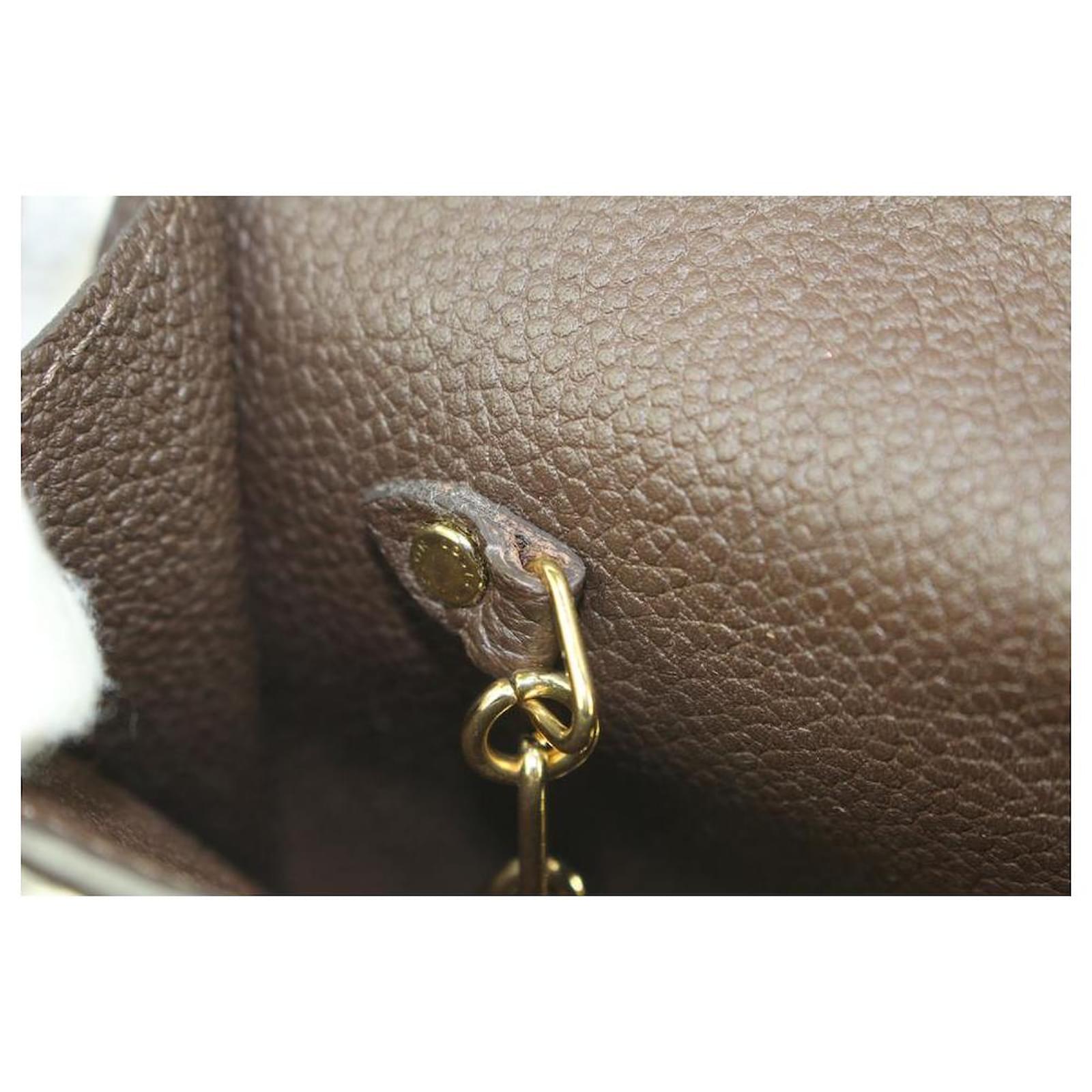 monogram empreinte leather key