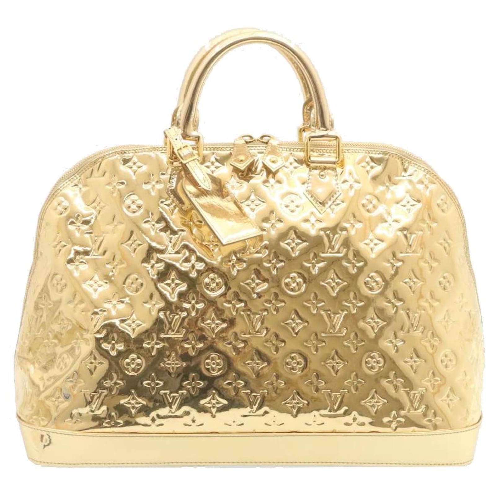 Monedero Louis Vuitton Etoile para mujer con monograma / oro Castaño Lienzo  ref.1005806 - Joli Closet