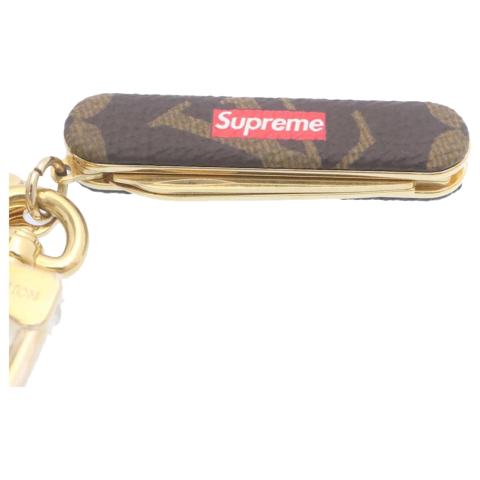 Louis Vuitton X Supreme Pocket Knife Keychain Available For