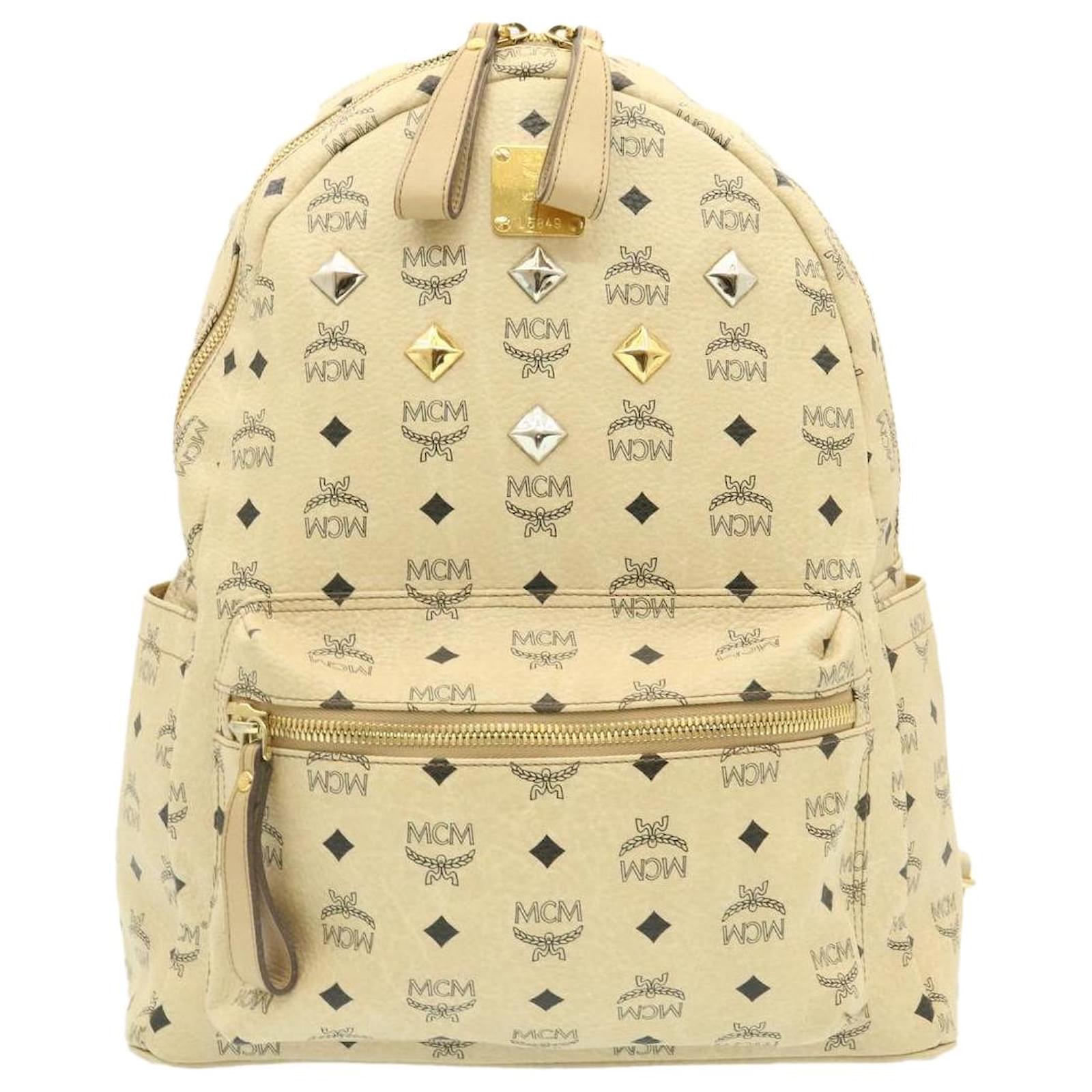 mcm yellow backpack