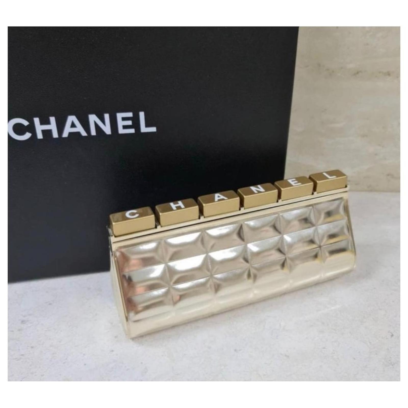 chanel gold bar clutch