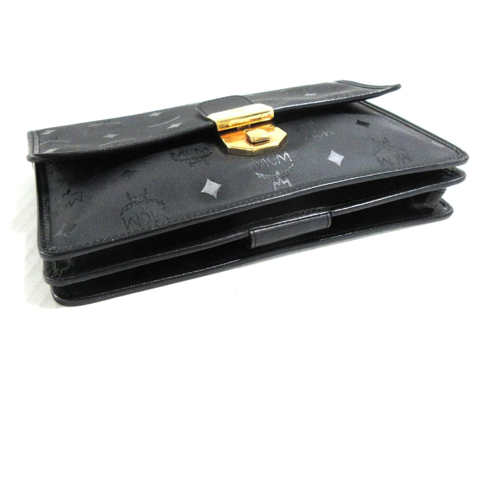 Clutch bag MCM Black in Synthetic - 25924379