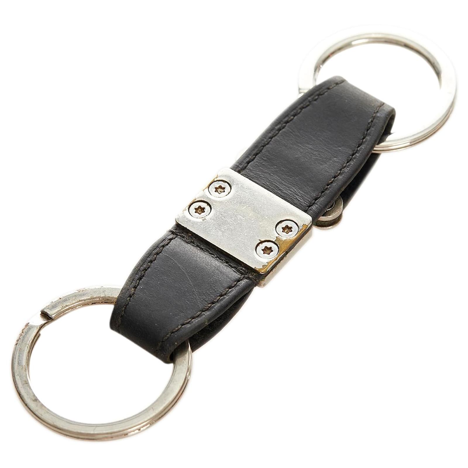 Louis Vuitton Black Leather Key Ring Silvery Metal Pony-style calfskin  ref.960959 - Joli Closet