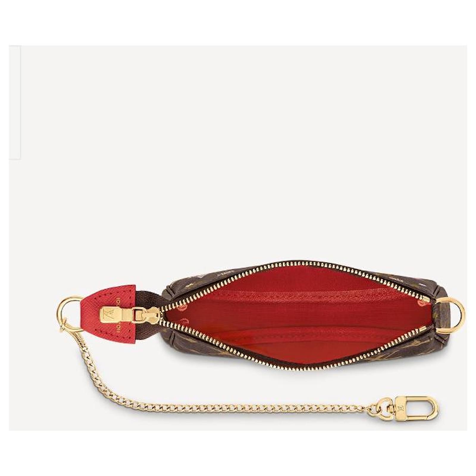 Louis Vuitton Monogram mini pouch Brown Leather ref.400239 - Joli