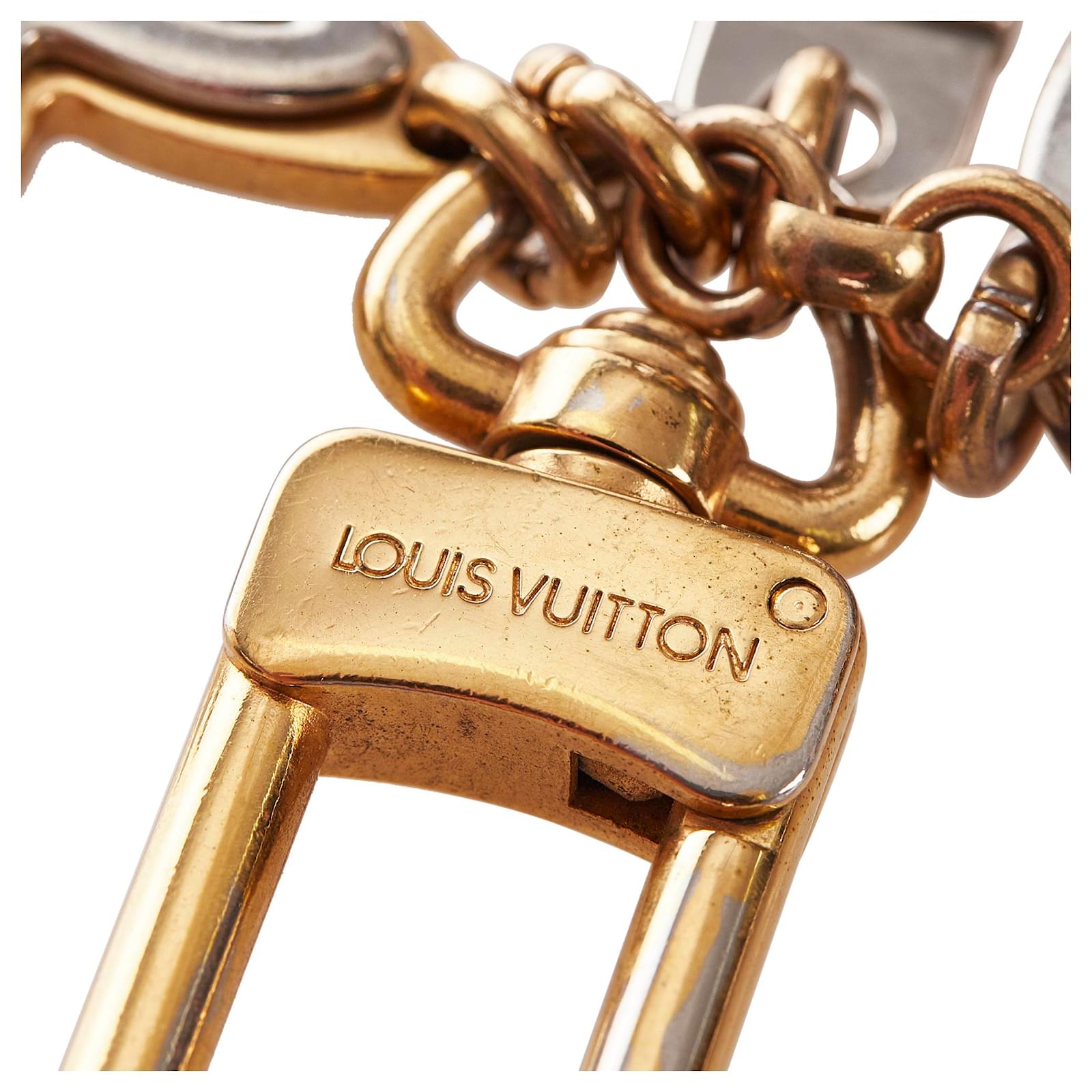 Louis Vuitton Gold Porte Cles Insolence Key Chain Silvery Golden Metal  ref.328136 - Joli Closet